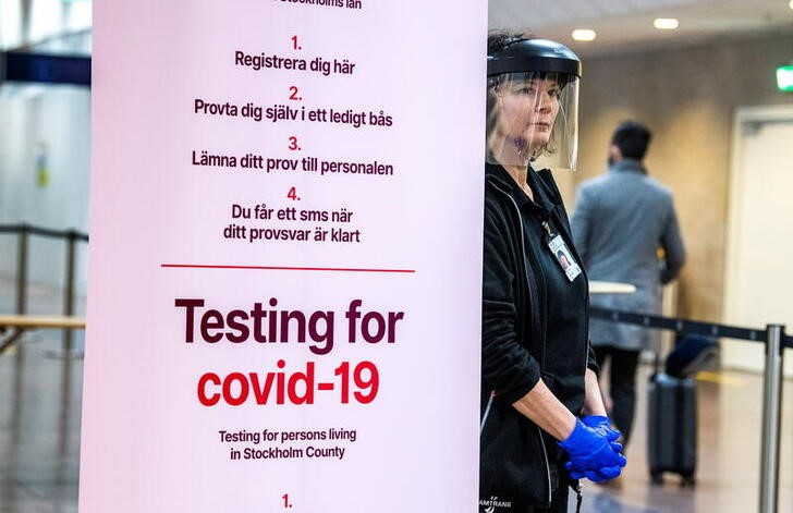 Asa Wernsten works at a coronavirus disease (COVID-19) test station for the for arriving passengers at Arlanda airport