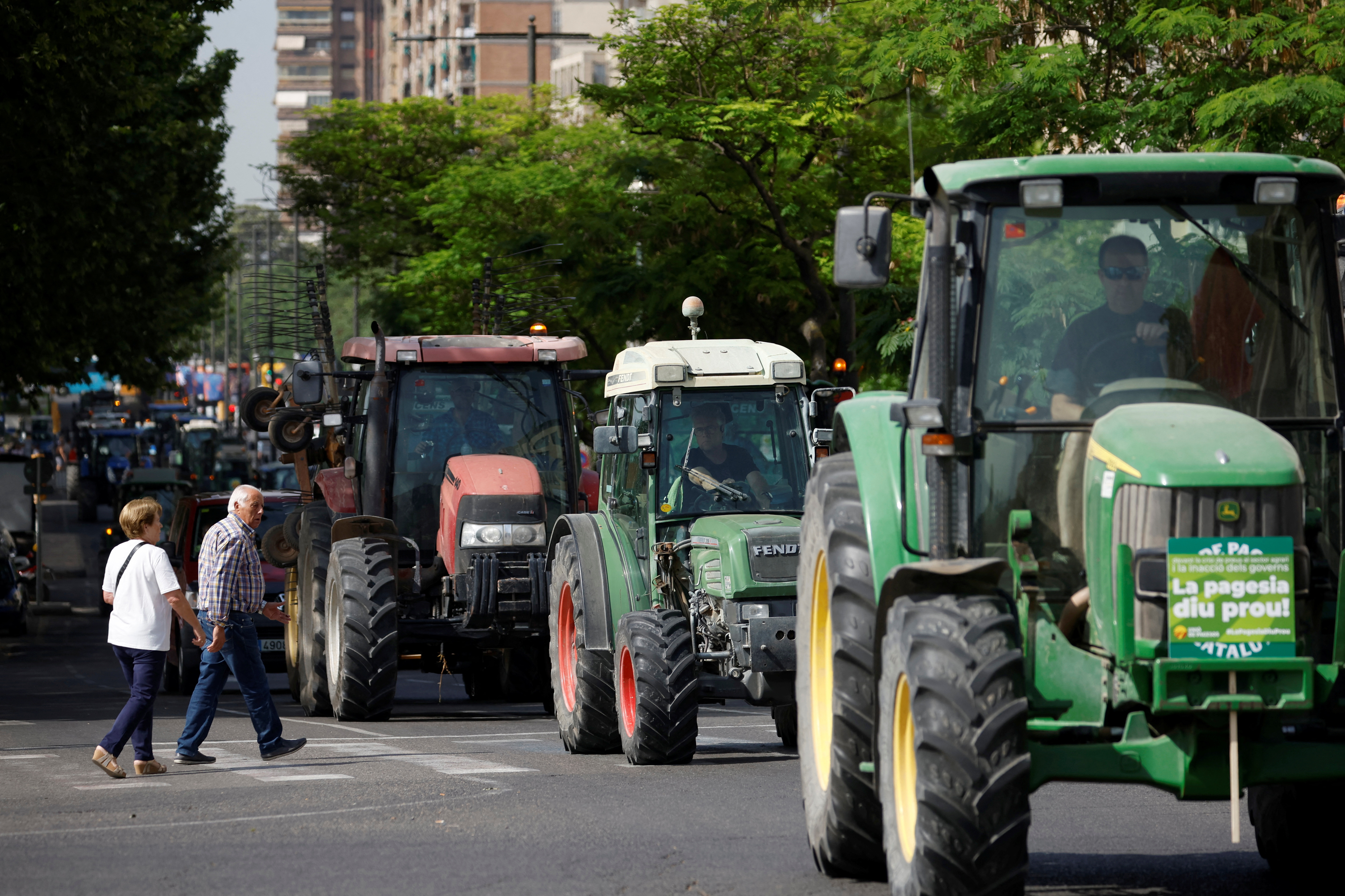 Spanish farmers in Catalonia stage a tractor go-slow protest against the effect of drought in Lleida