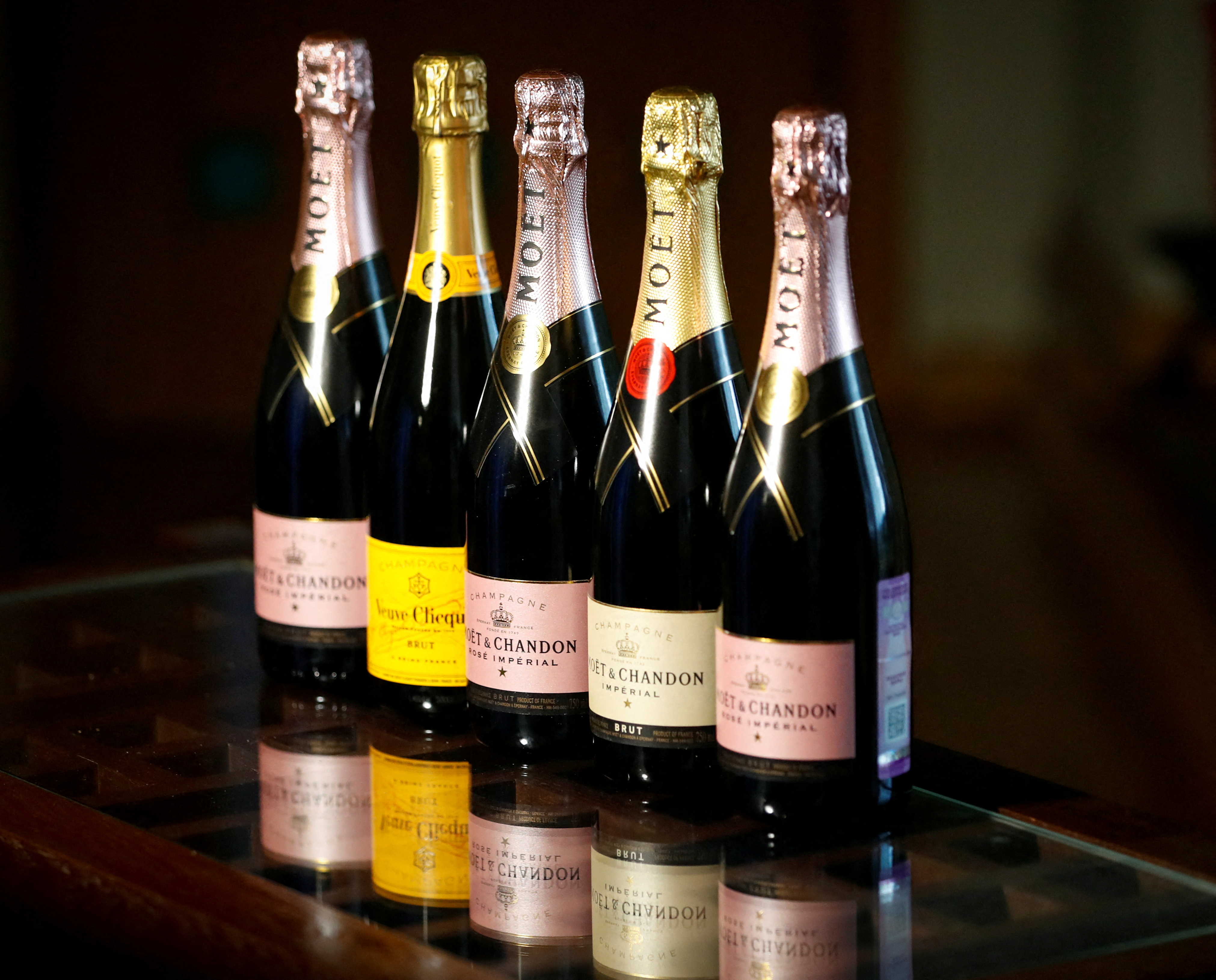 Bottles of Moet & Chandon and Veuve Clicquot French champagne are seen in this illustration picture