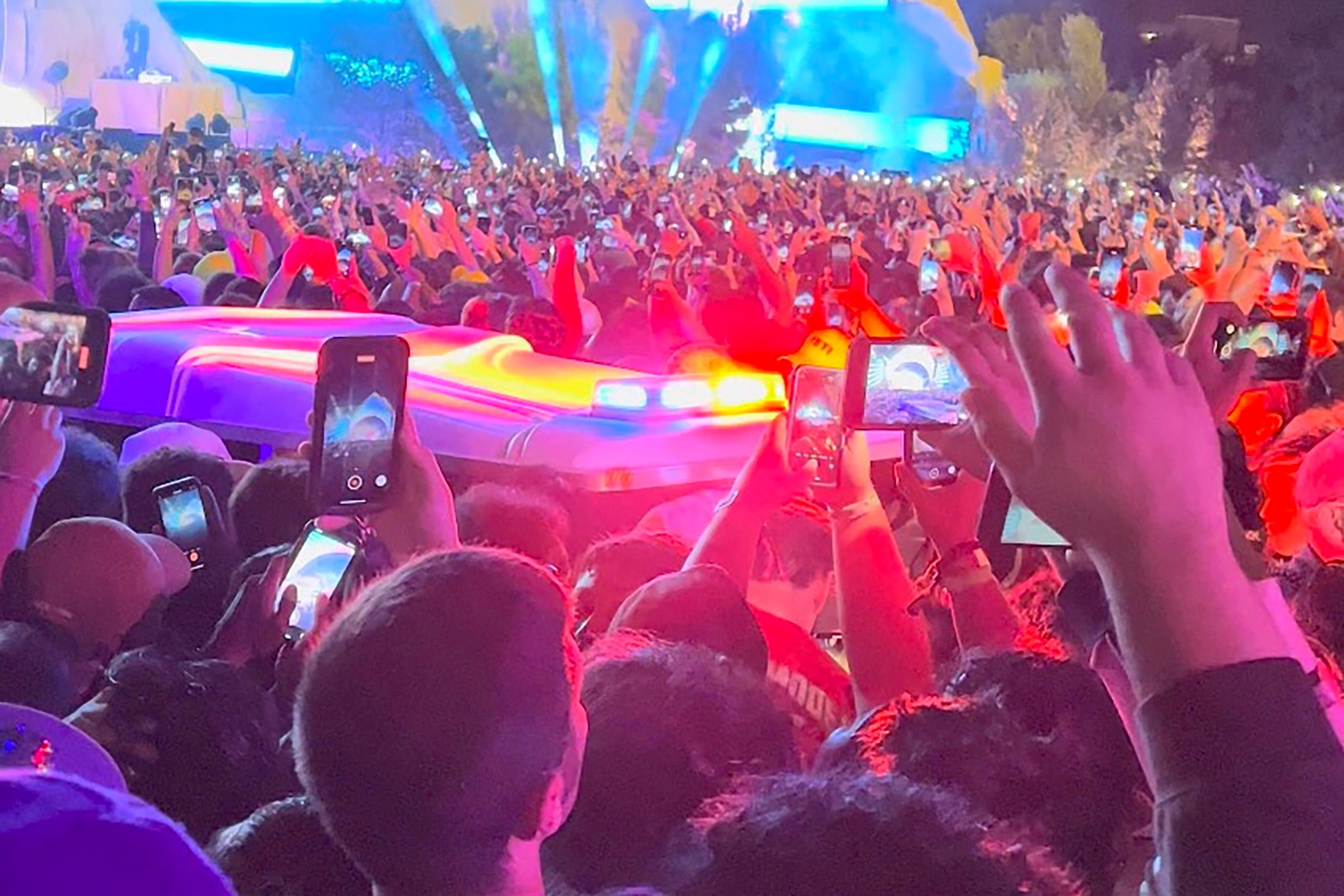 An ambulance is seen in the crowd during the Astroworld music festiwal in Houston, Texas, U.S., November 5, 2021 in this still image obtained from a social media video on November 6, 2021. Courtesy of Twitter @ONACASELLA /via REUTERS 