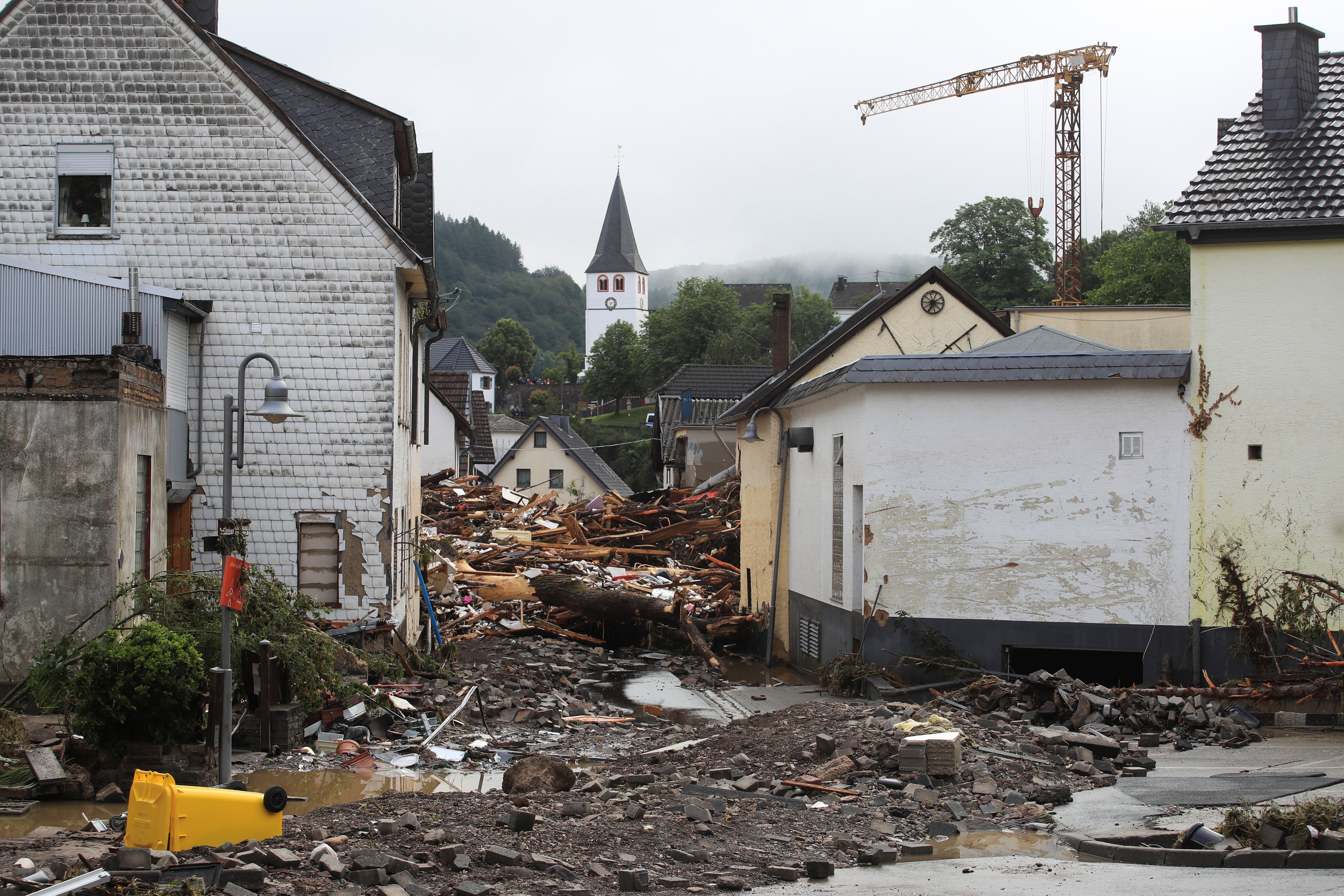 Collapsed buildings are seen on a flood-affected area following heavy rainfalls in Schuld, Germany, on July 15, 2021. REUTERS/Wolfgang Rattay