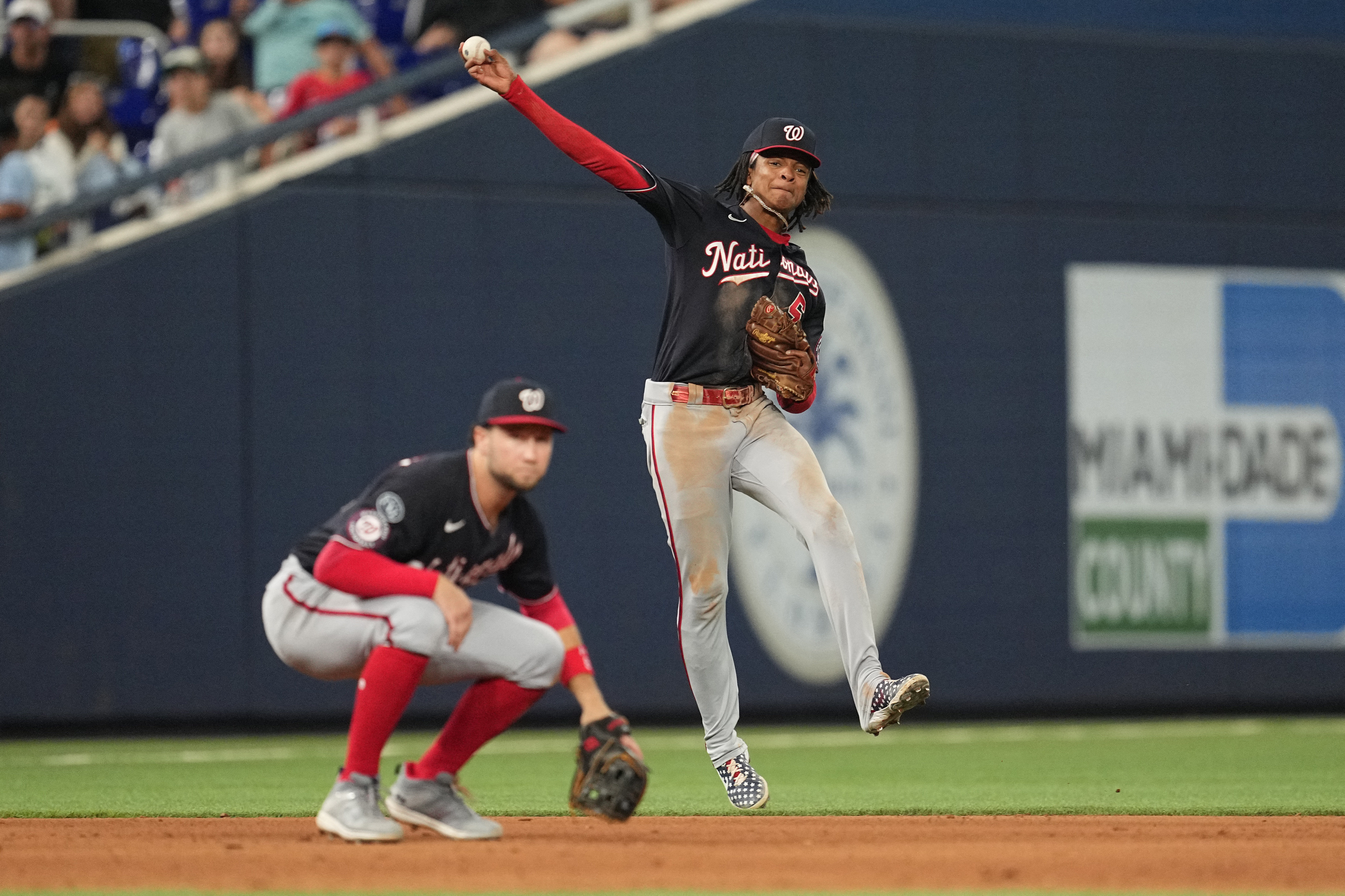 Adon leads Nationals over Marlins 7-4 for Washington's 10th win in