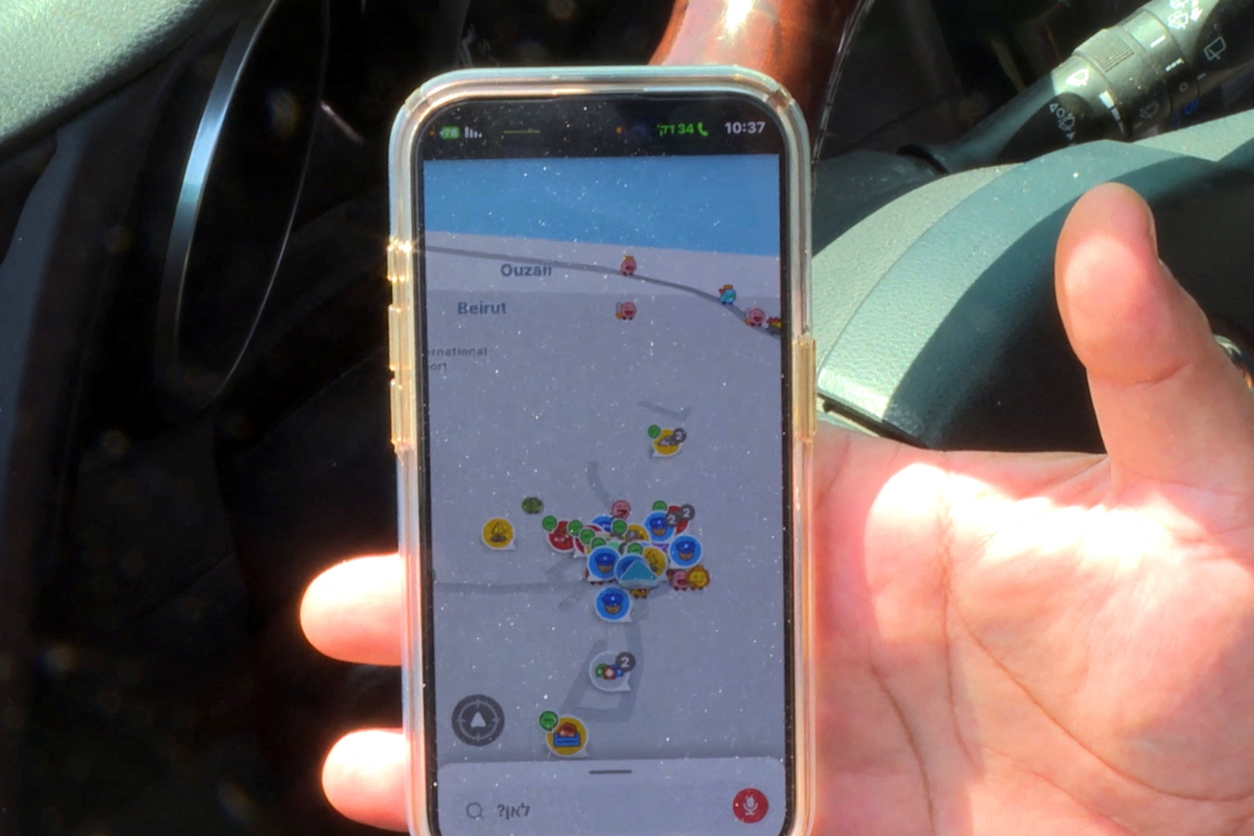 An Israeli driver uses Waze, an Israeli mobile satellite navigation application showing his location as near Beirut in Lebanon, amid concerns of a possible escalation in violence after the killing of Iranian generals in Damascus, in Tel Aviv
