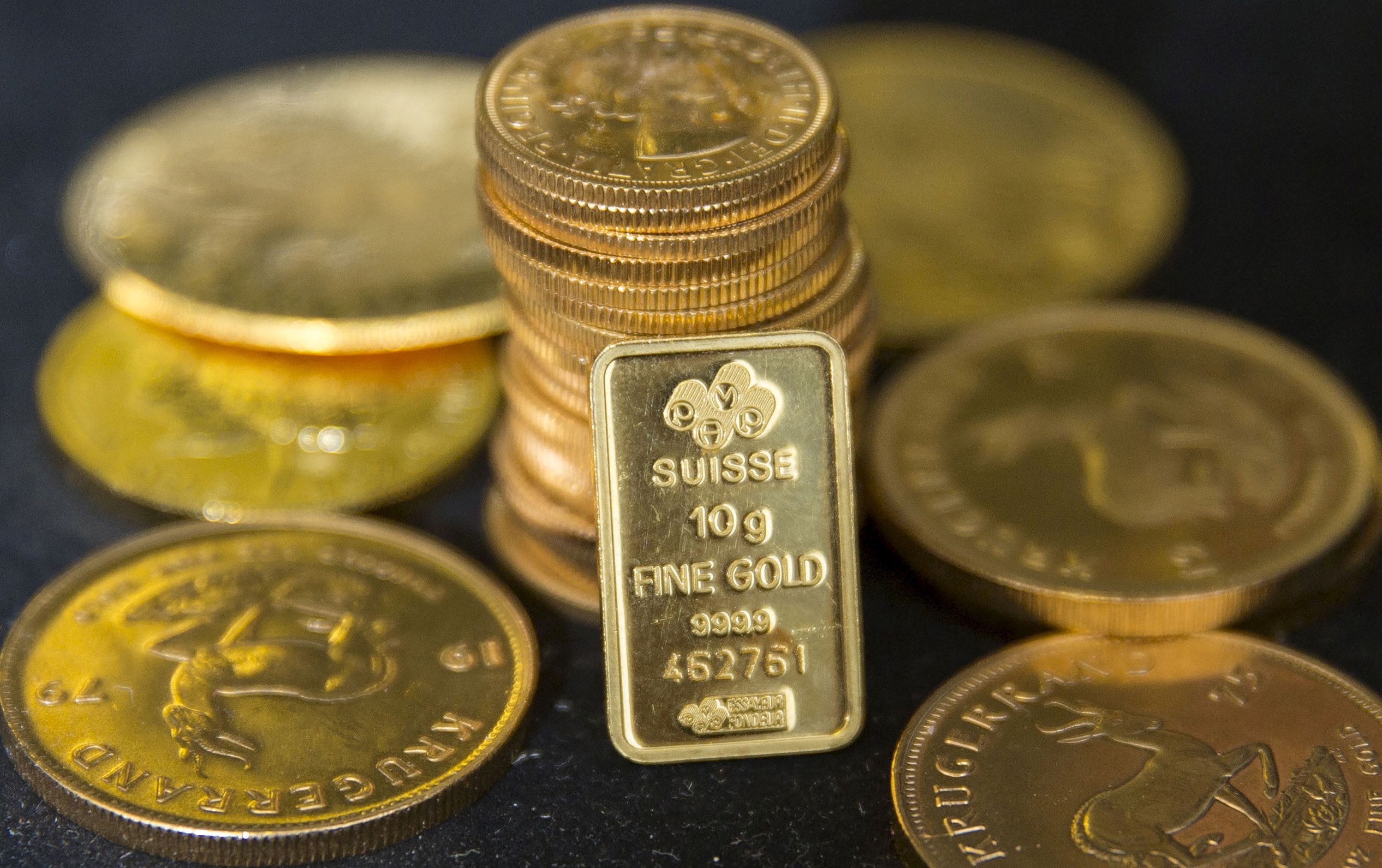 How investors buy gold and what drives the market | Reuters