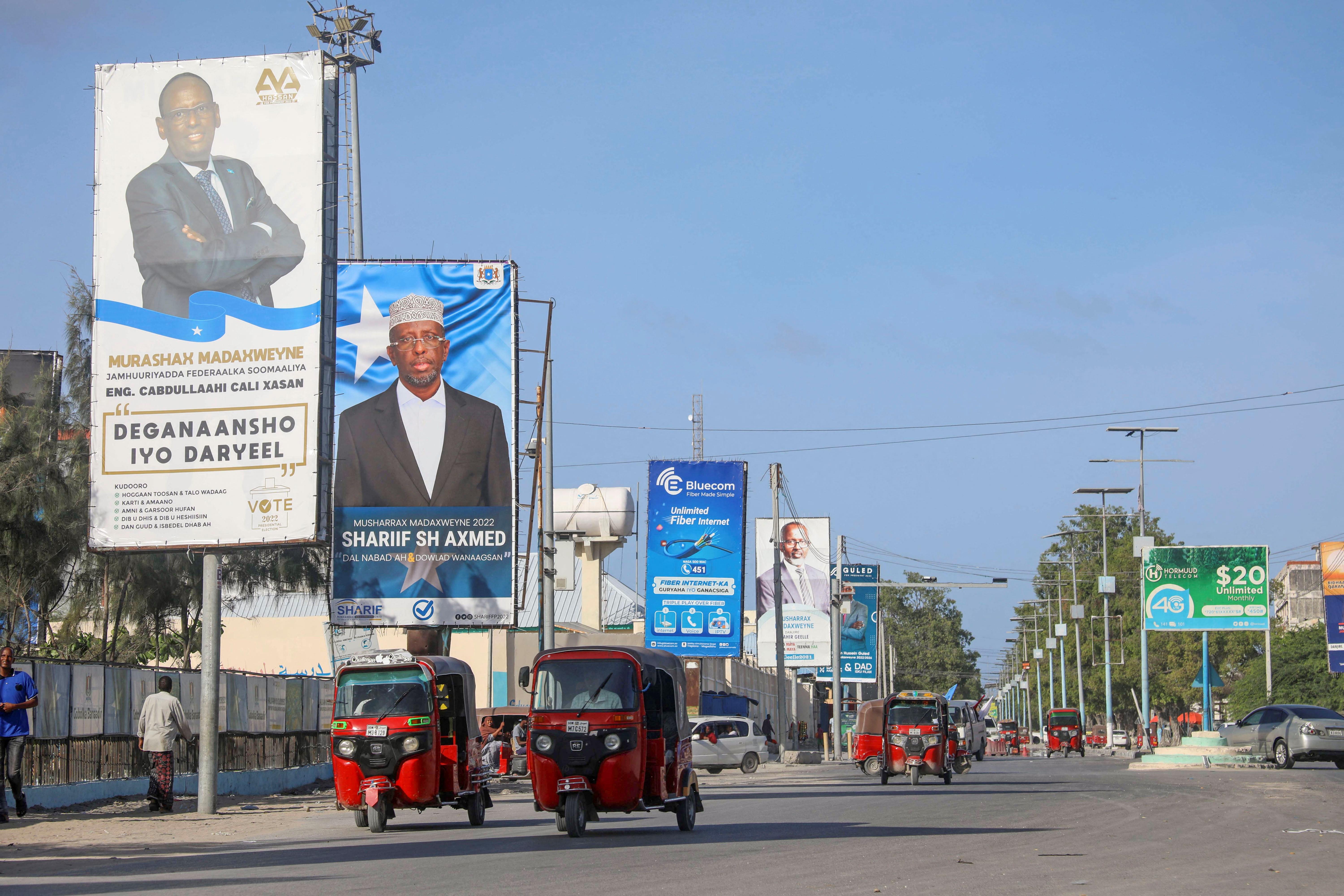 Election banners of Somali presidential candidates are seen along a street in Mogadishu
