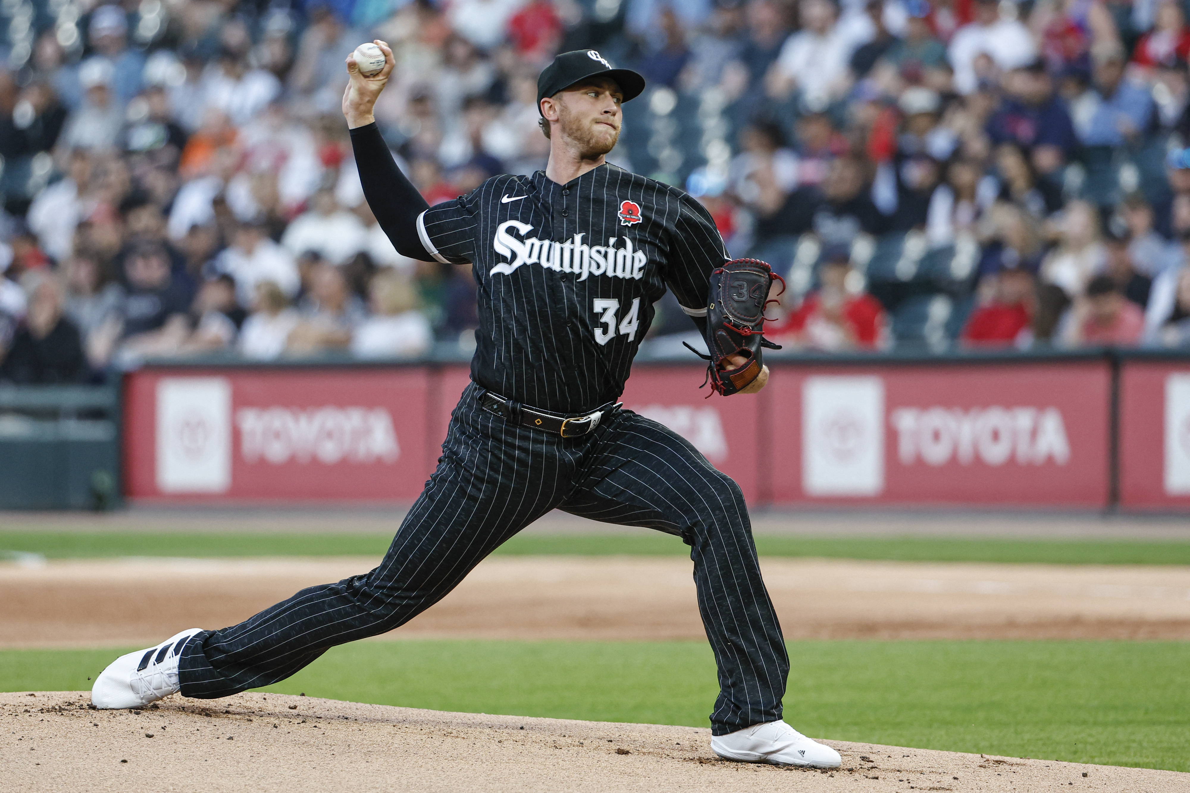 Angels set tone early, hold on to beat White Sox