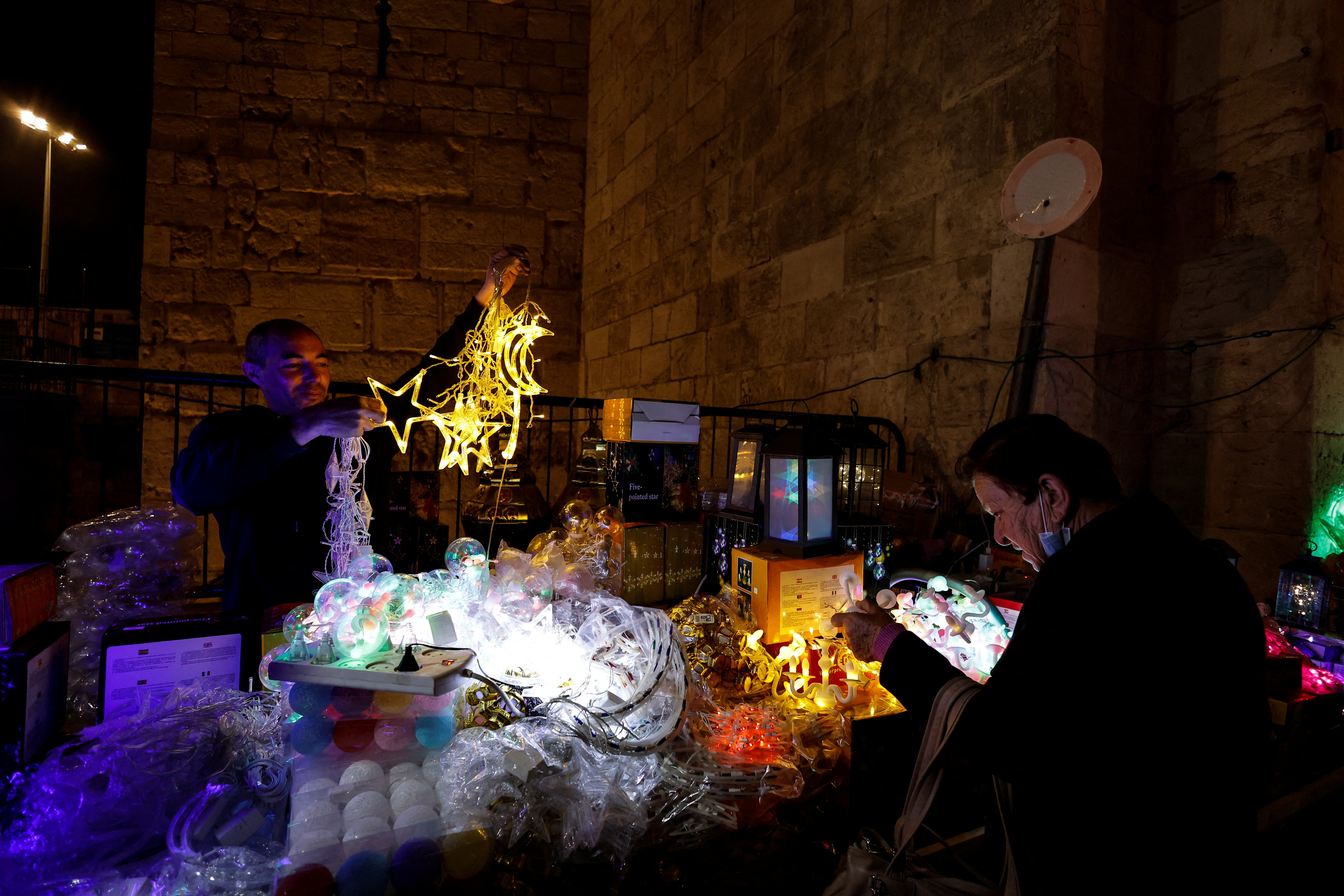 A vendor sells decorations ahead of the holy month of Ramadan in Jerusalem's Old City