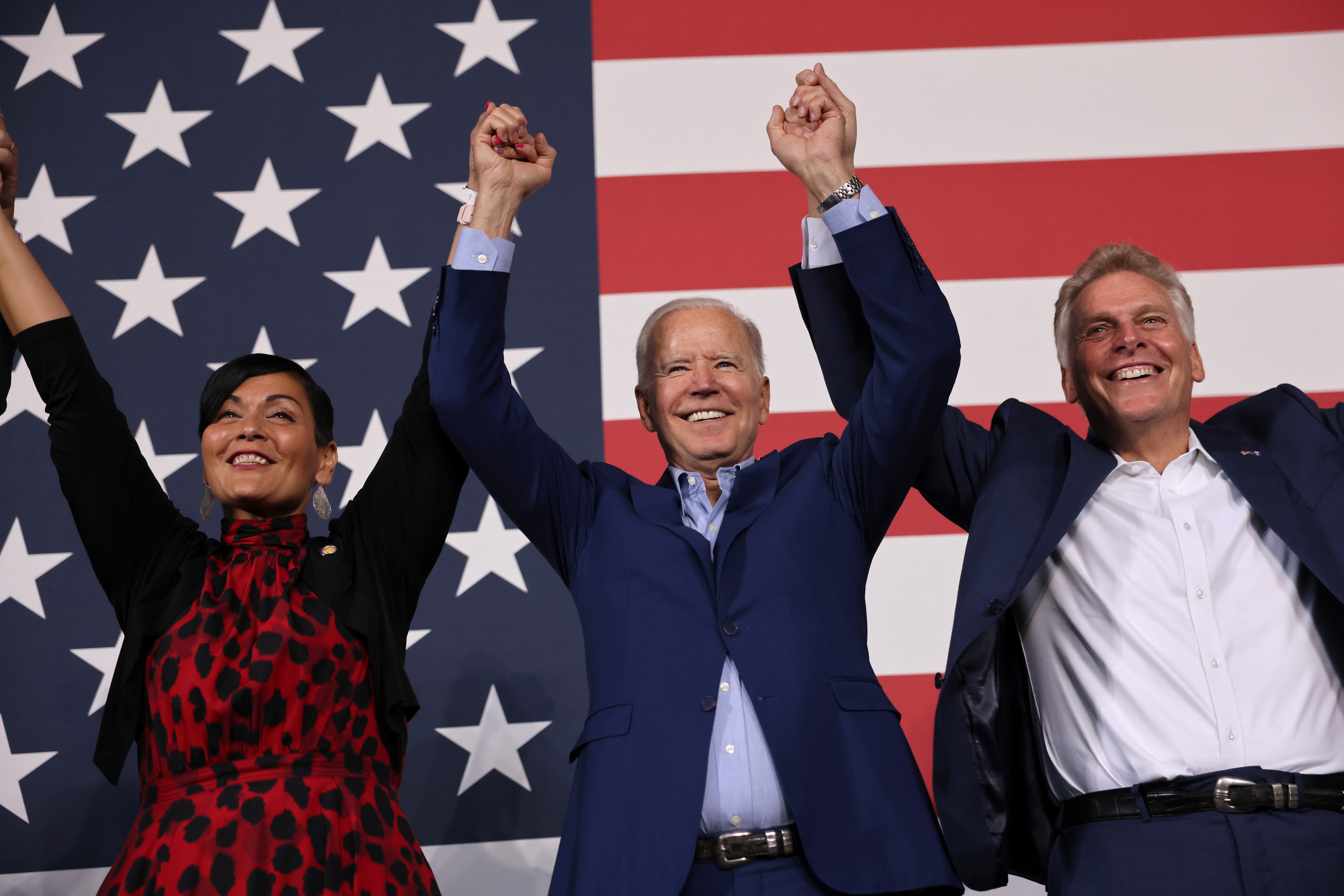 U.S. President Joe Biden participates in a campaign event with candidate for Lieutenant Governor of Virginia, Hala Ayala, and candidate for Governor Terry McAuliffe, at Lubber Run Park in Arlington, Virginia, U.S., July 23, 2021. REUTERS/Evelyn Hockstein