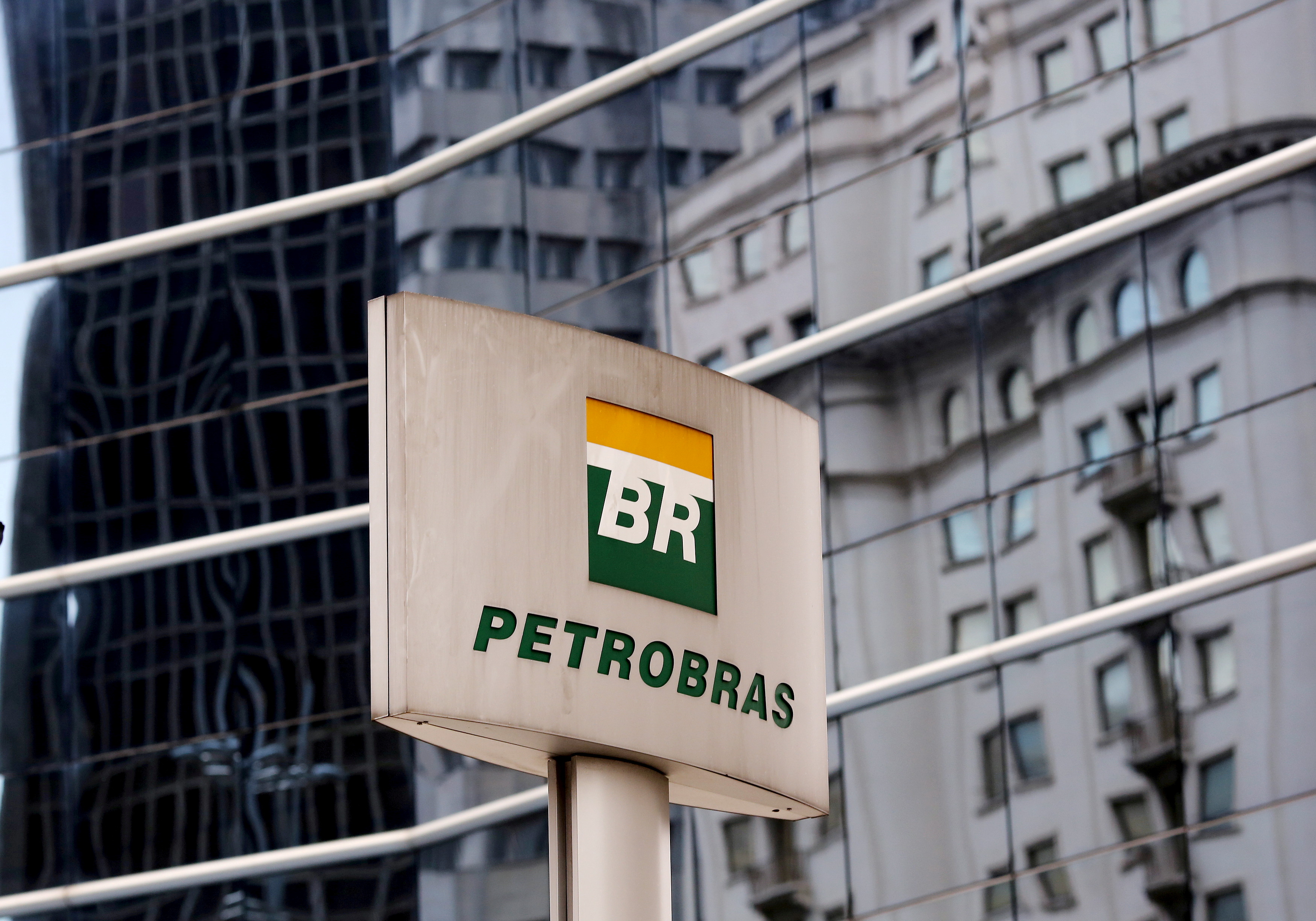 The Petrobras logo is seen in front of the company's headquarters in Sao Paulo April 23, 2015. REUTERS/Paulo Whitaker