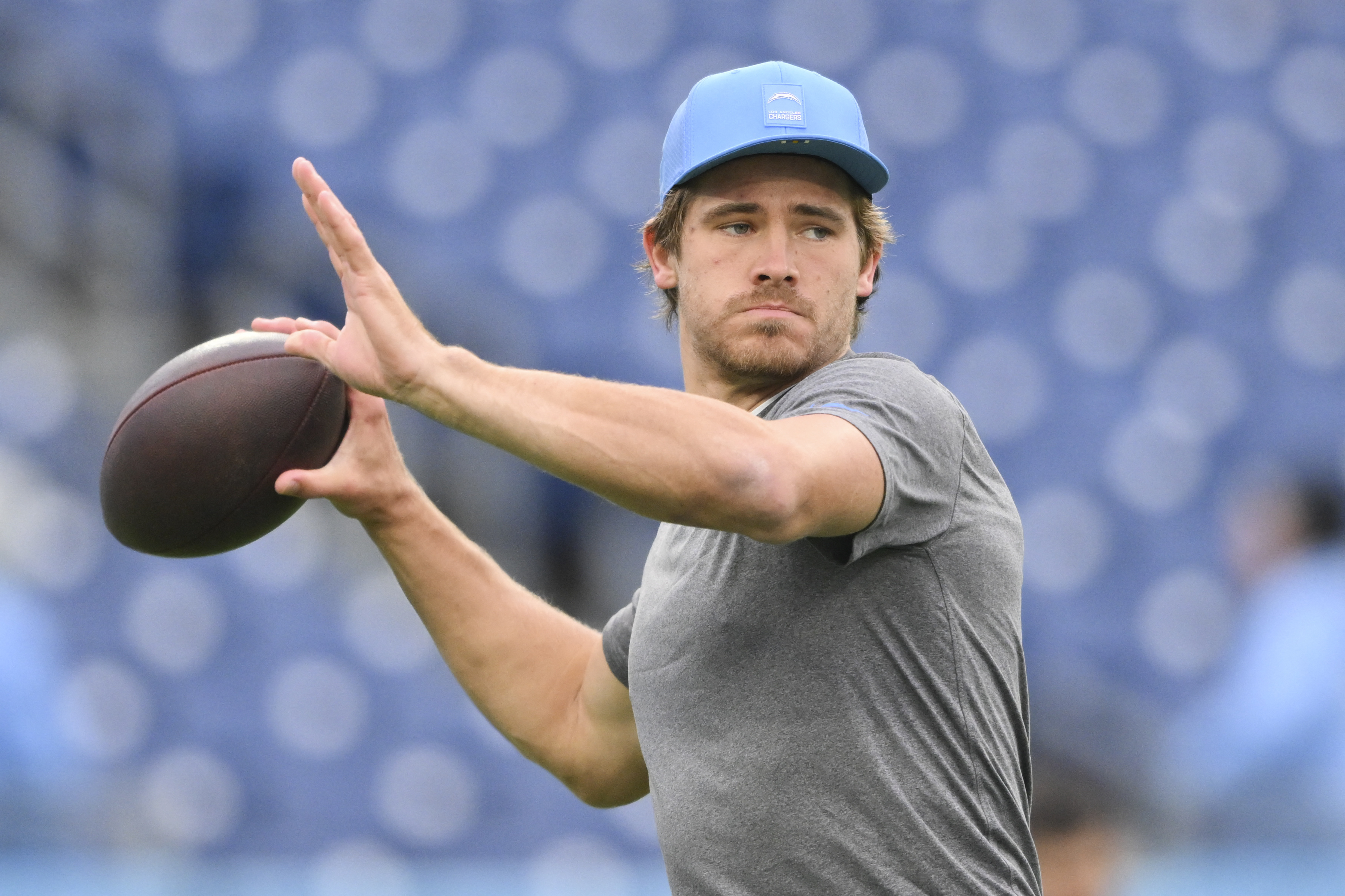 Justin Herbert's 3-TD day pushes Chargers past Titans | Reuters