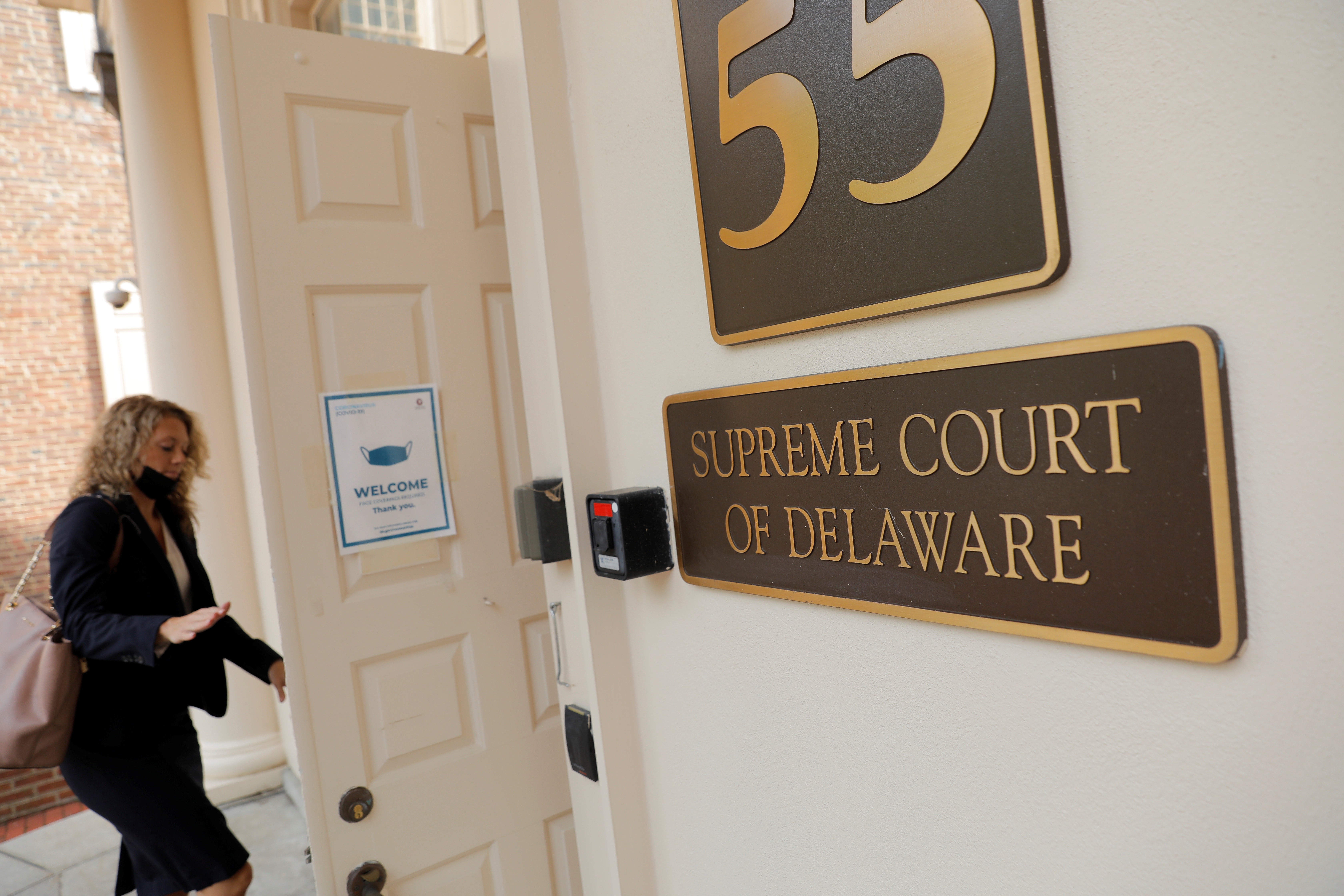 A person enters the Delaware Supreme Court in Dover, Delaware