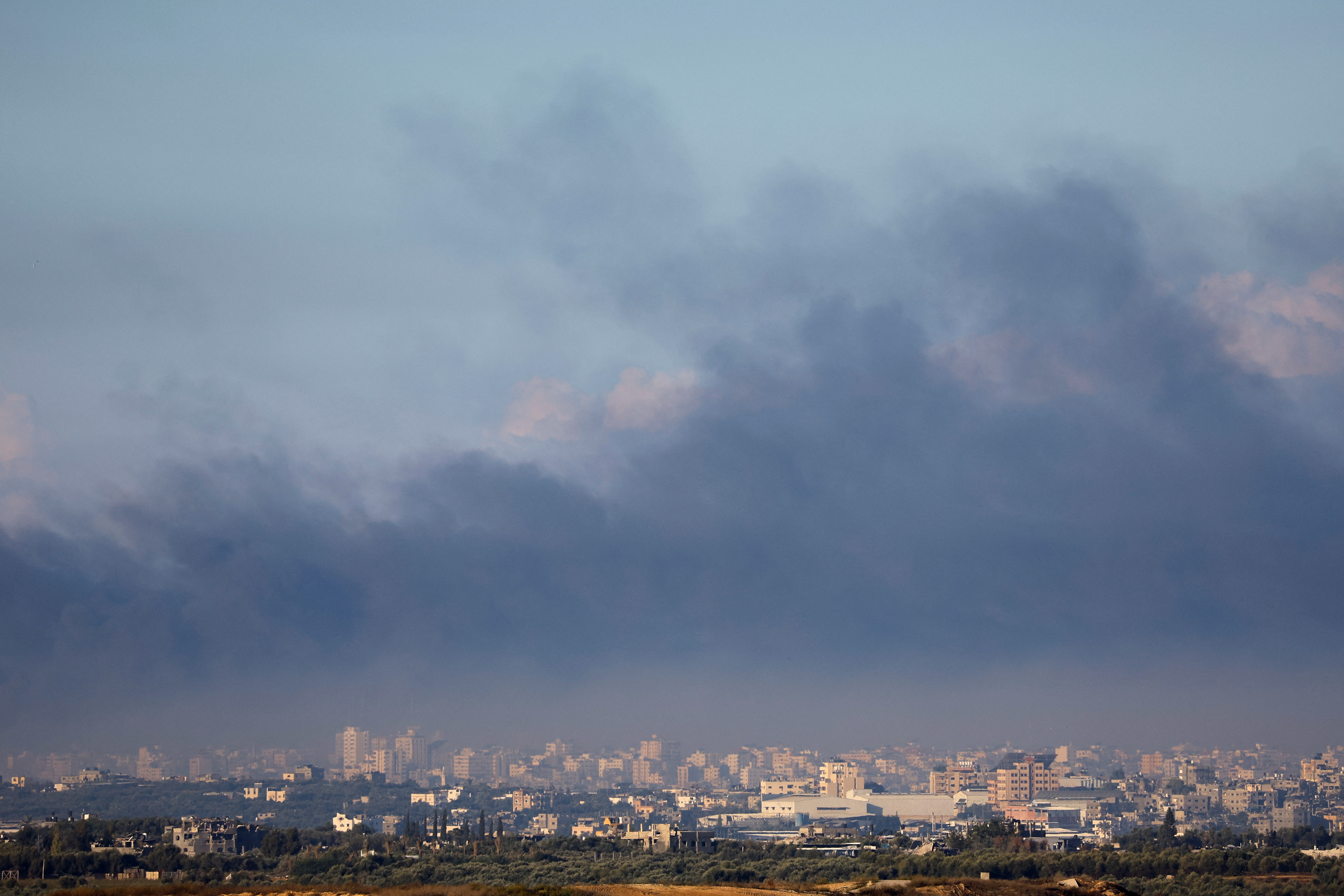 Smoke rises in Gaza, as seen from southern Israel, amid the ongoing conflict between Israel and the Palestinian group Hamas