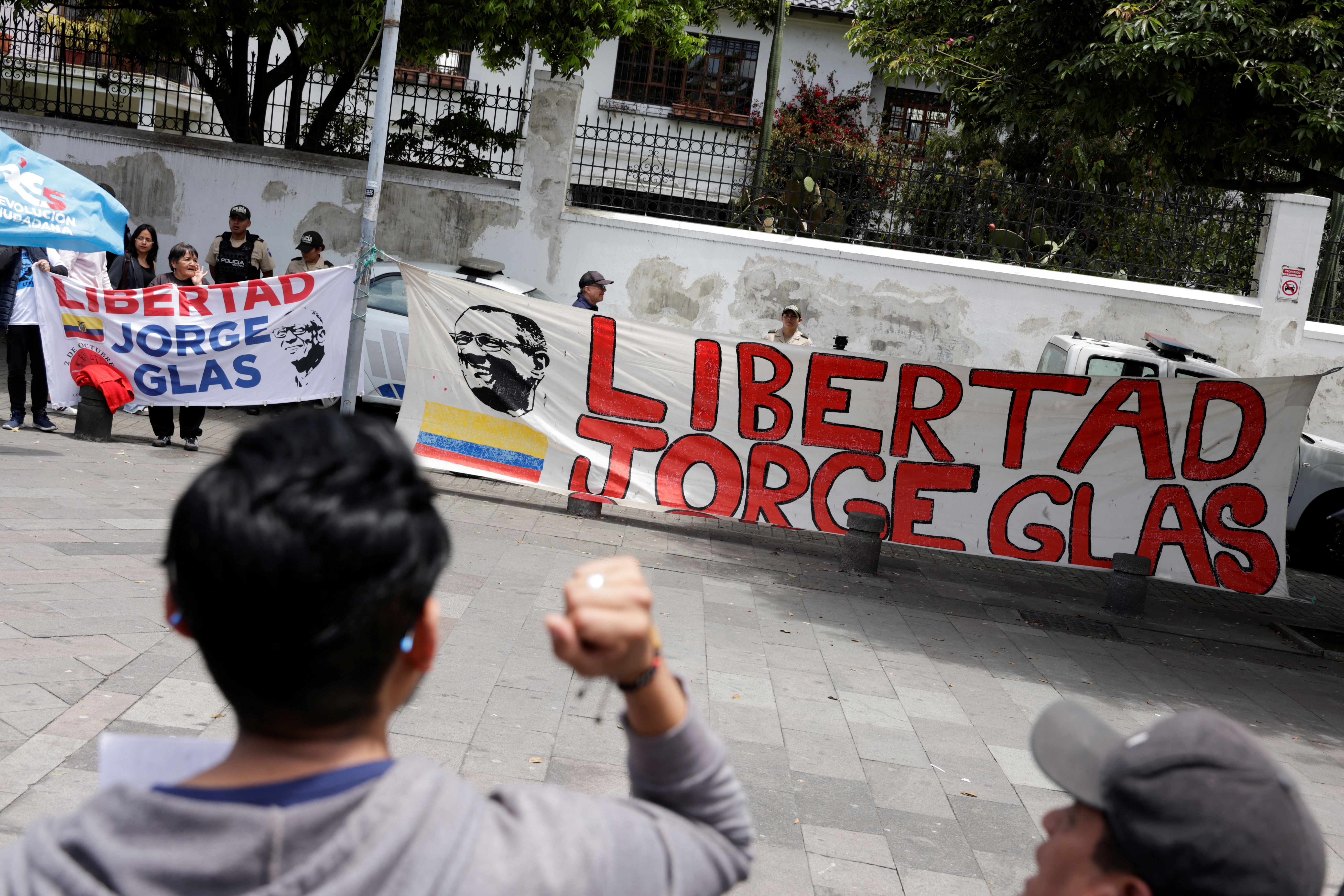 Demonstrators gather outside the Mexican embassy in Ecuador to ask for the freedom of former Ecuador VP Glas, in Quito