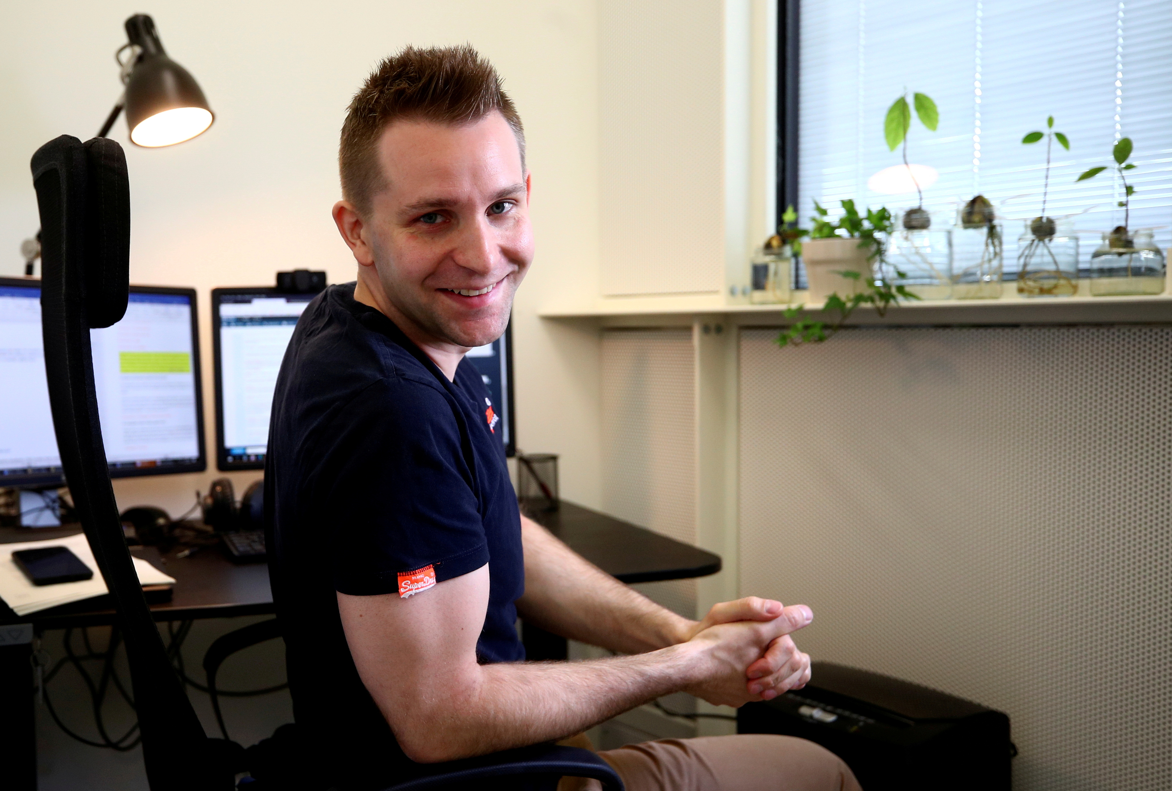 Max Schrems sits in his office ahead of a Reuters interview in Vienna