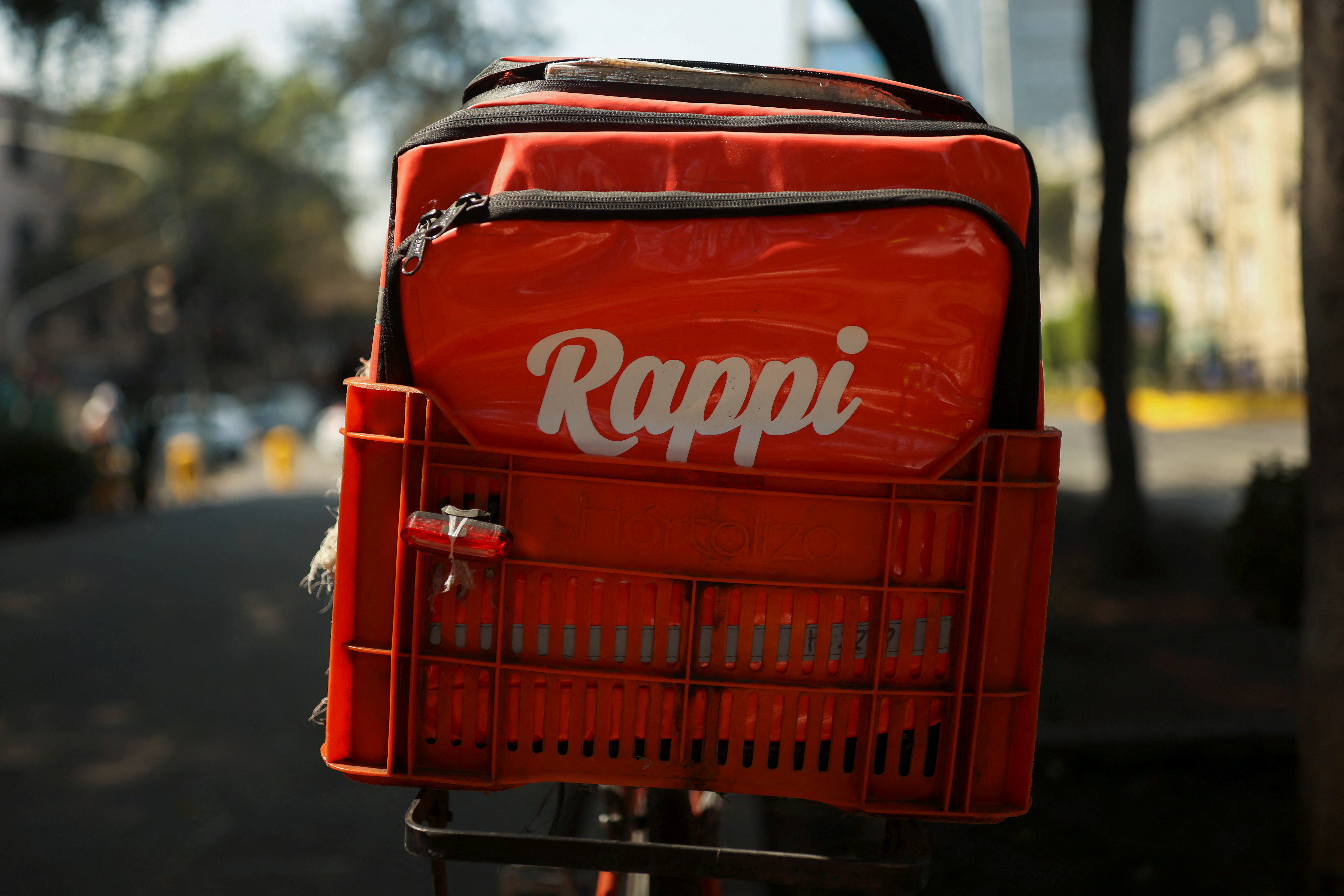 The logo of Colombian on-demand delivery company Rappi is seen on a delivery bag in Mexico City