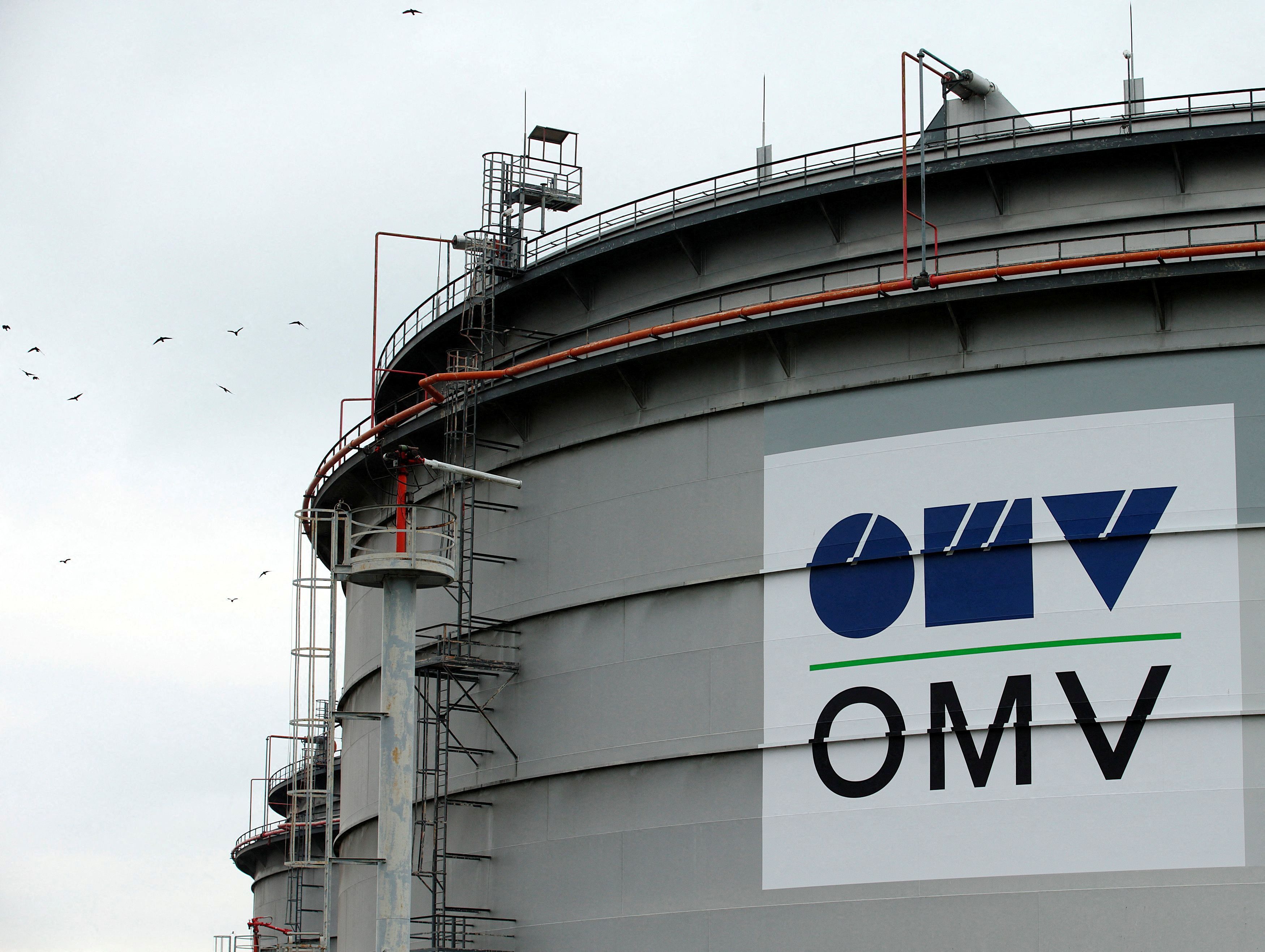 The logo of Austrian oil and gas group OMV is pictured on an oil tank at the refinery in Schwechat