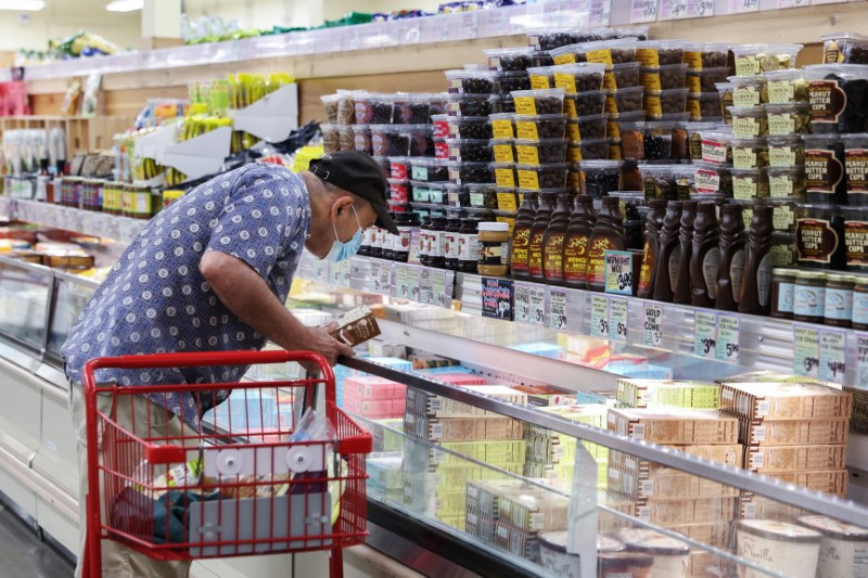 A person shops in a supermarket as inflation affected consumer prices in Manhattan, New York City