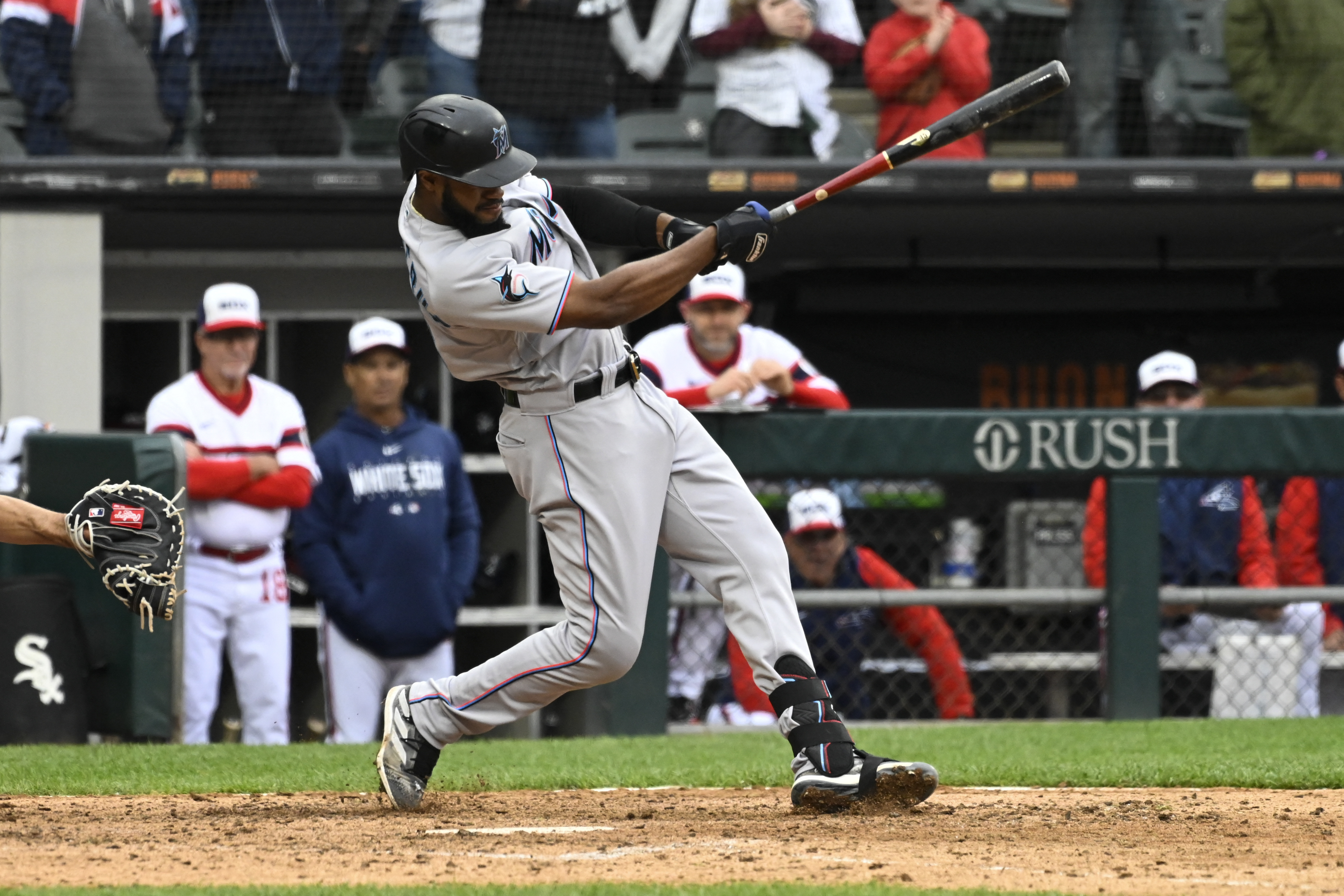 Marlins storm back with three-run ninth to topple White Sox