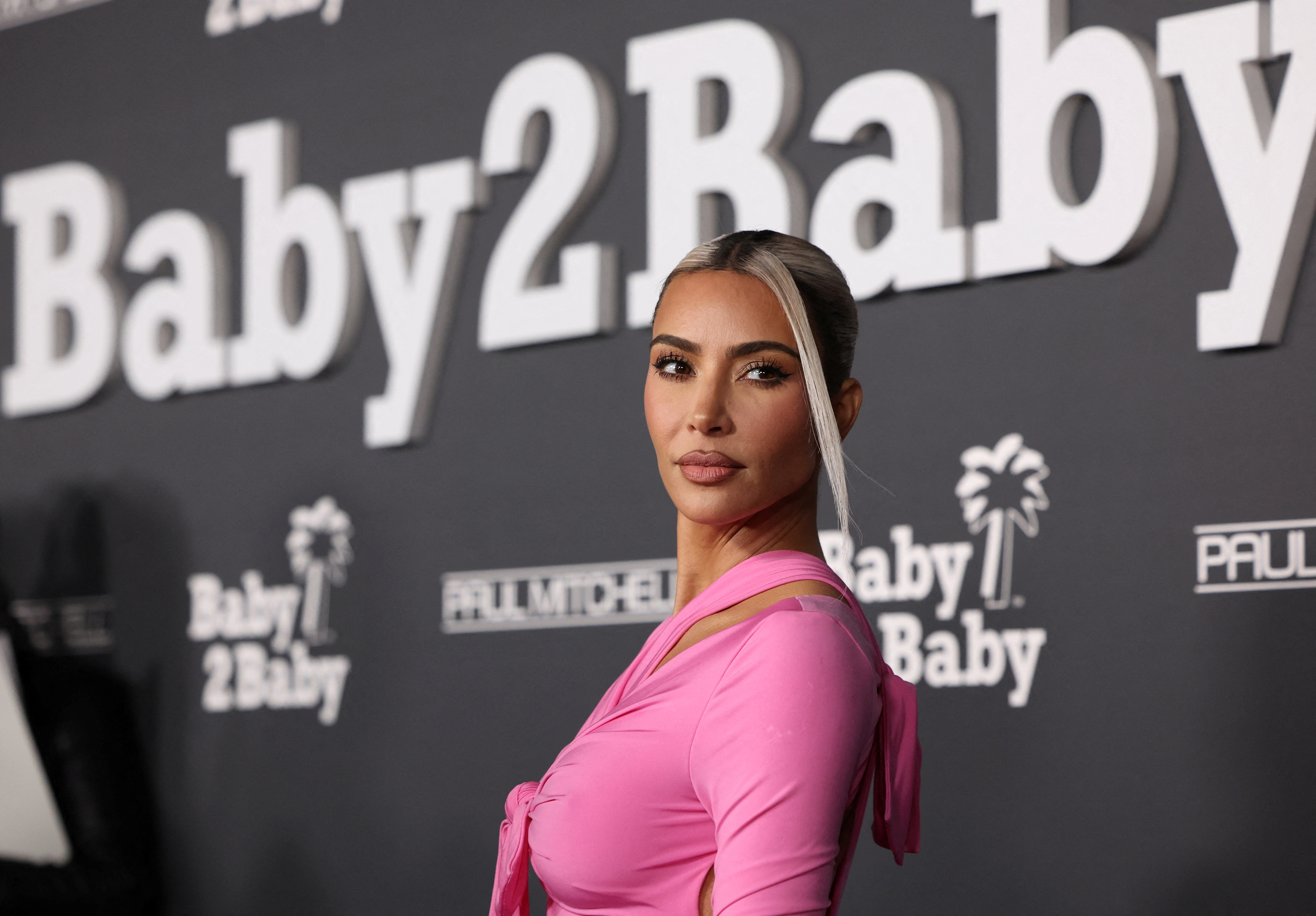 Kim Kardashian, other celebrities beat EMax crypto investors' lawsuit - Reuters