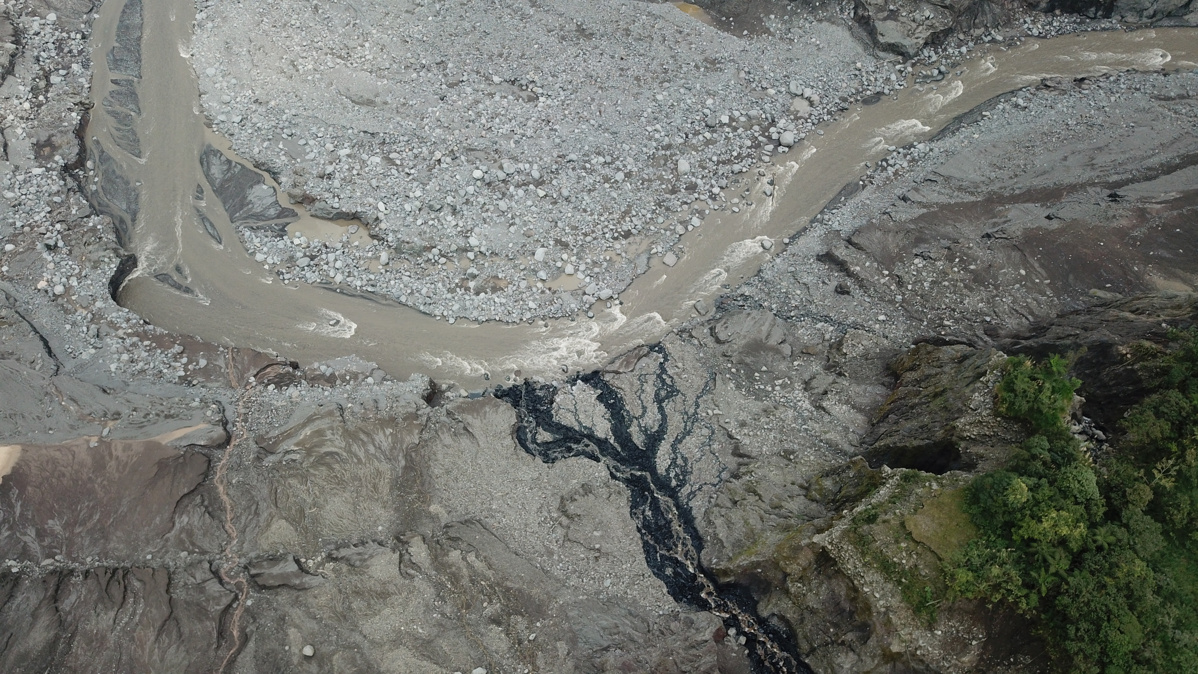 Spillage from an oil pipeline rupture is seen in Piedra Fina, Ecuador