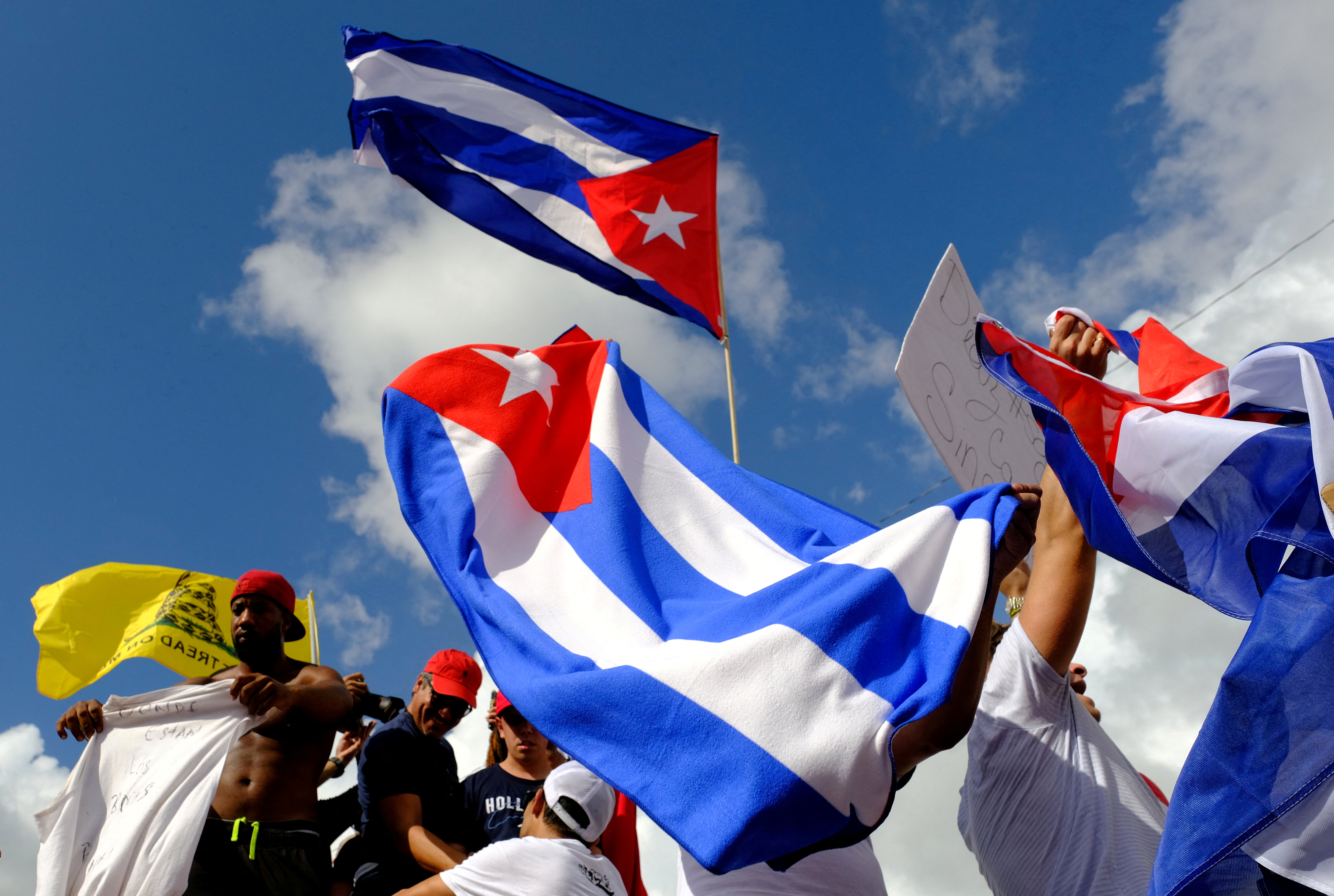 Emigres in Little Havana react to reports of protests in Cuba against the deteriorating economy
