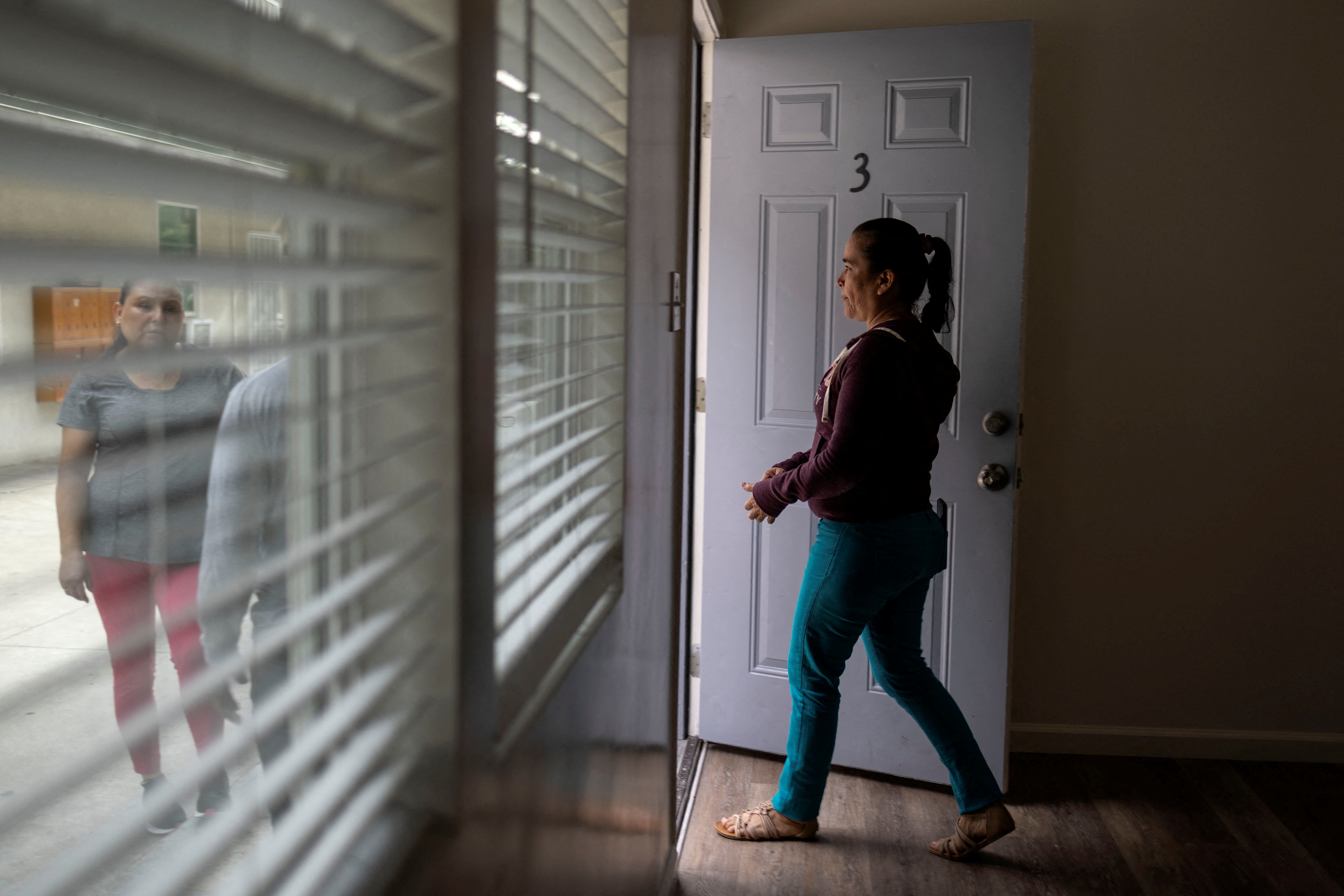 Maria Hernandez visits a potential apartment to rent, after reunification with her two daughters, in Los Angeles