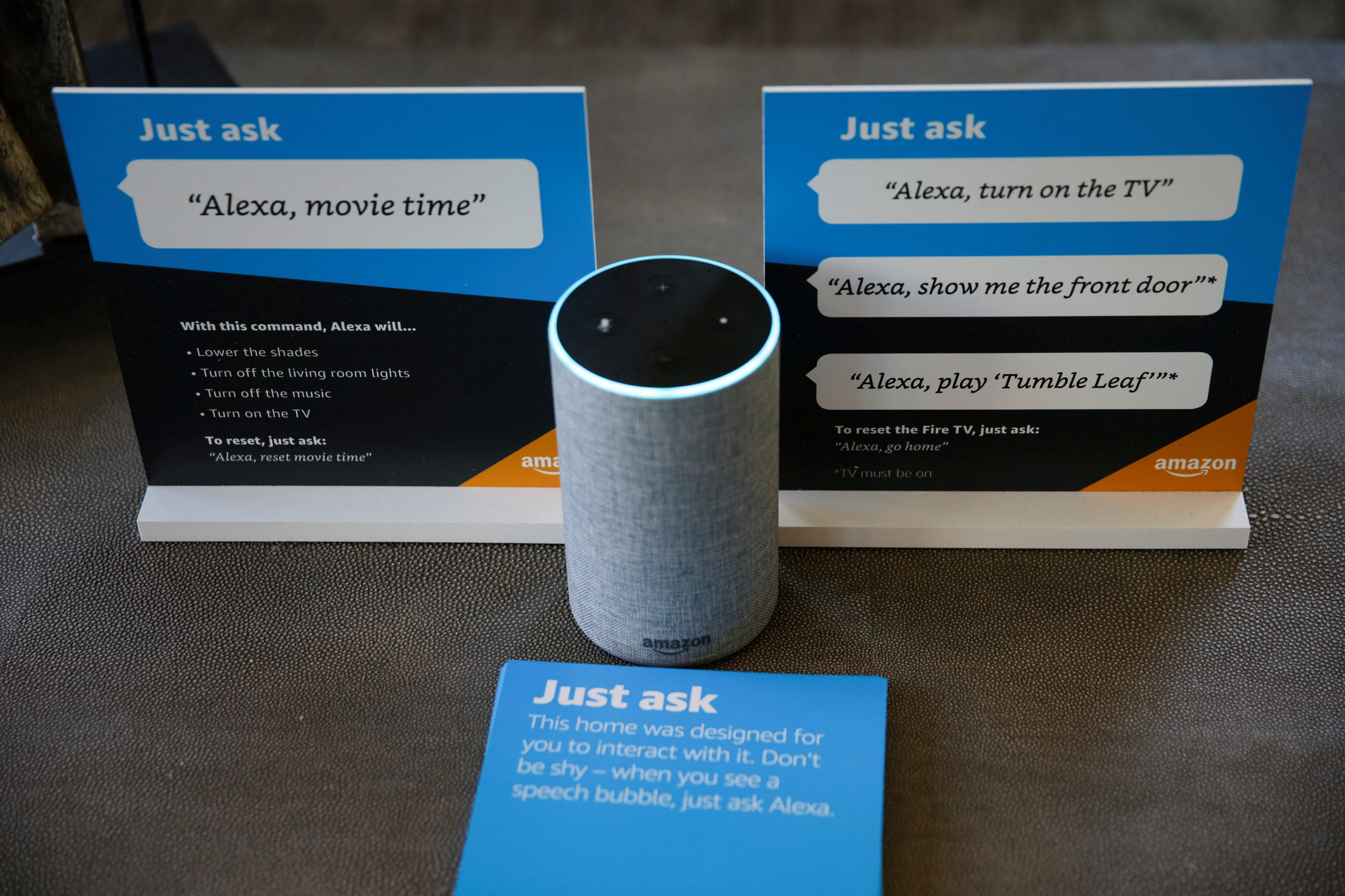 Prompts on how to use Amazon's Alexa personal assistant are seen alongside an Amazon Echo in an Amazon ‘experience center’  in Vallejo