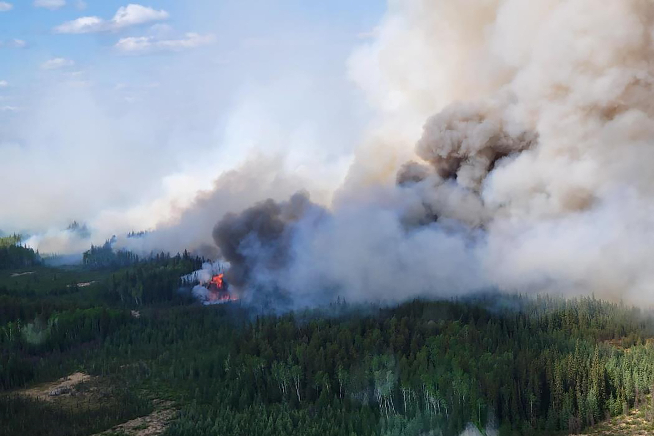 The Paskwa fire (HWF030) burns near Fox Lake