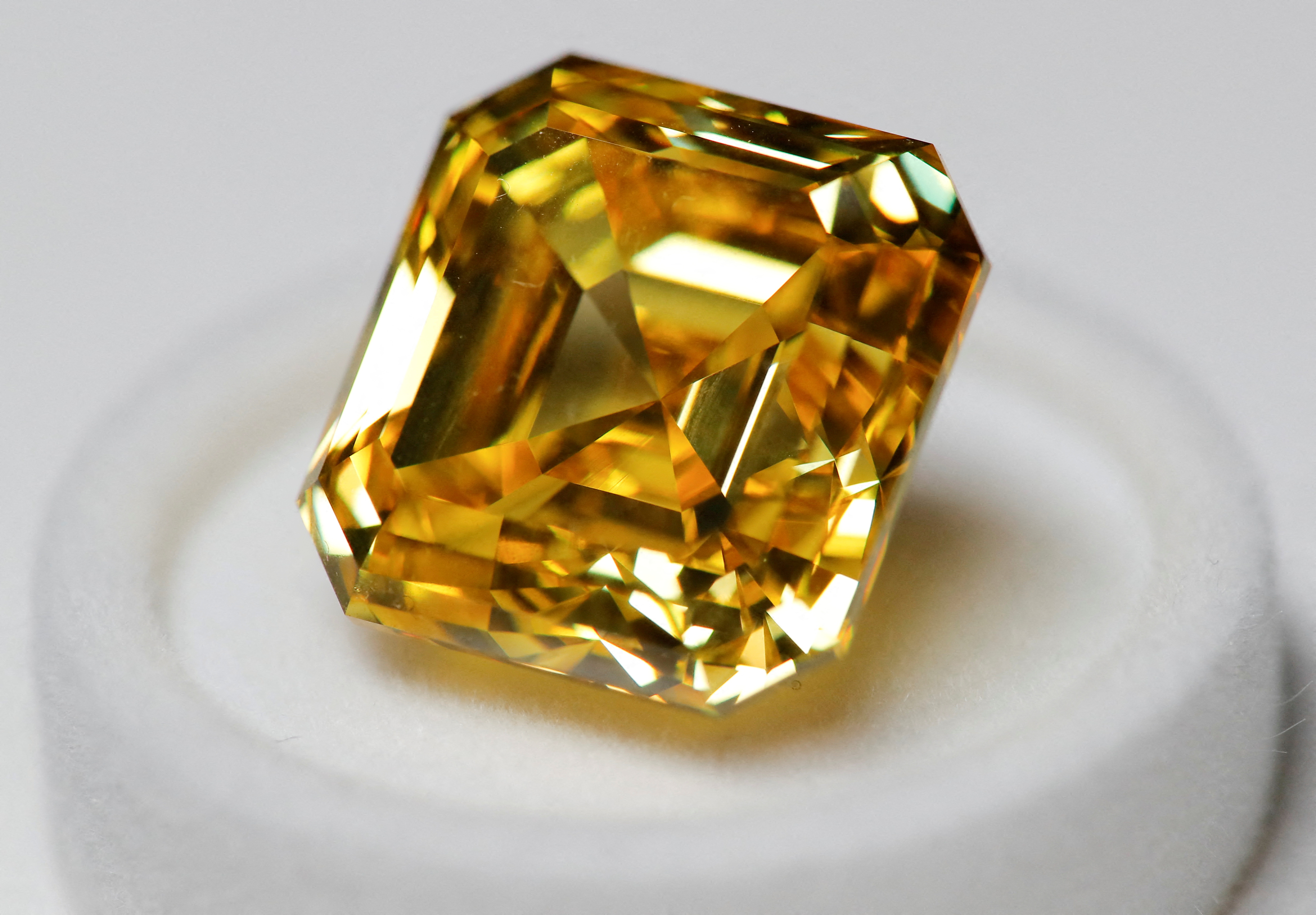 A 20,69-carat yellow diamond is pictured during an official presentation by diamond producer Alrosa in Moscow