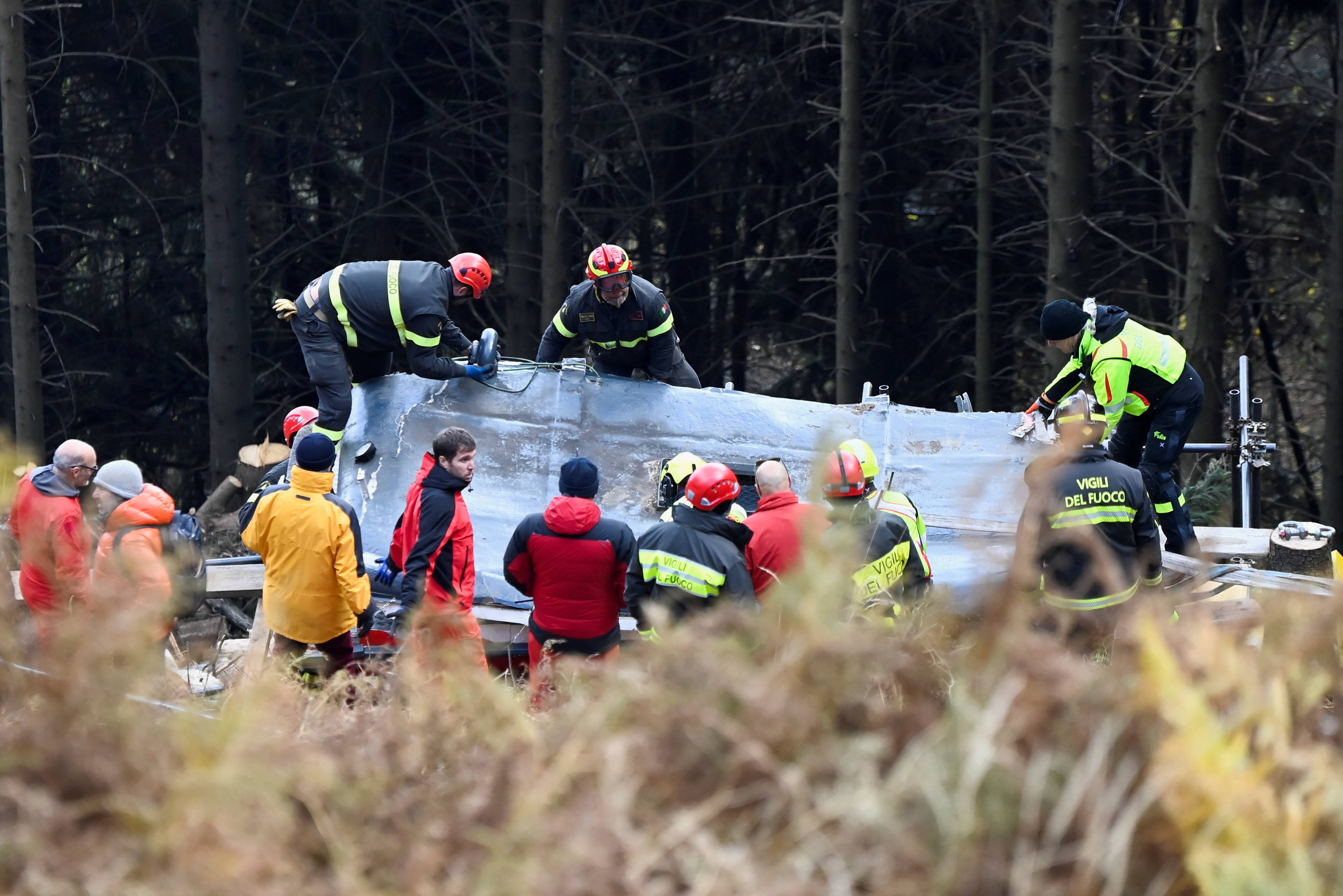 Italian fire brigade works to remove crashed cable car cabin, which left 14 people dead, after it collapsed on May 23, 2021, in Stresa, near Lake Maggiore, Italy November 8, 2021. REUTERS/Flavio Lo Scalzo/File Photo