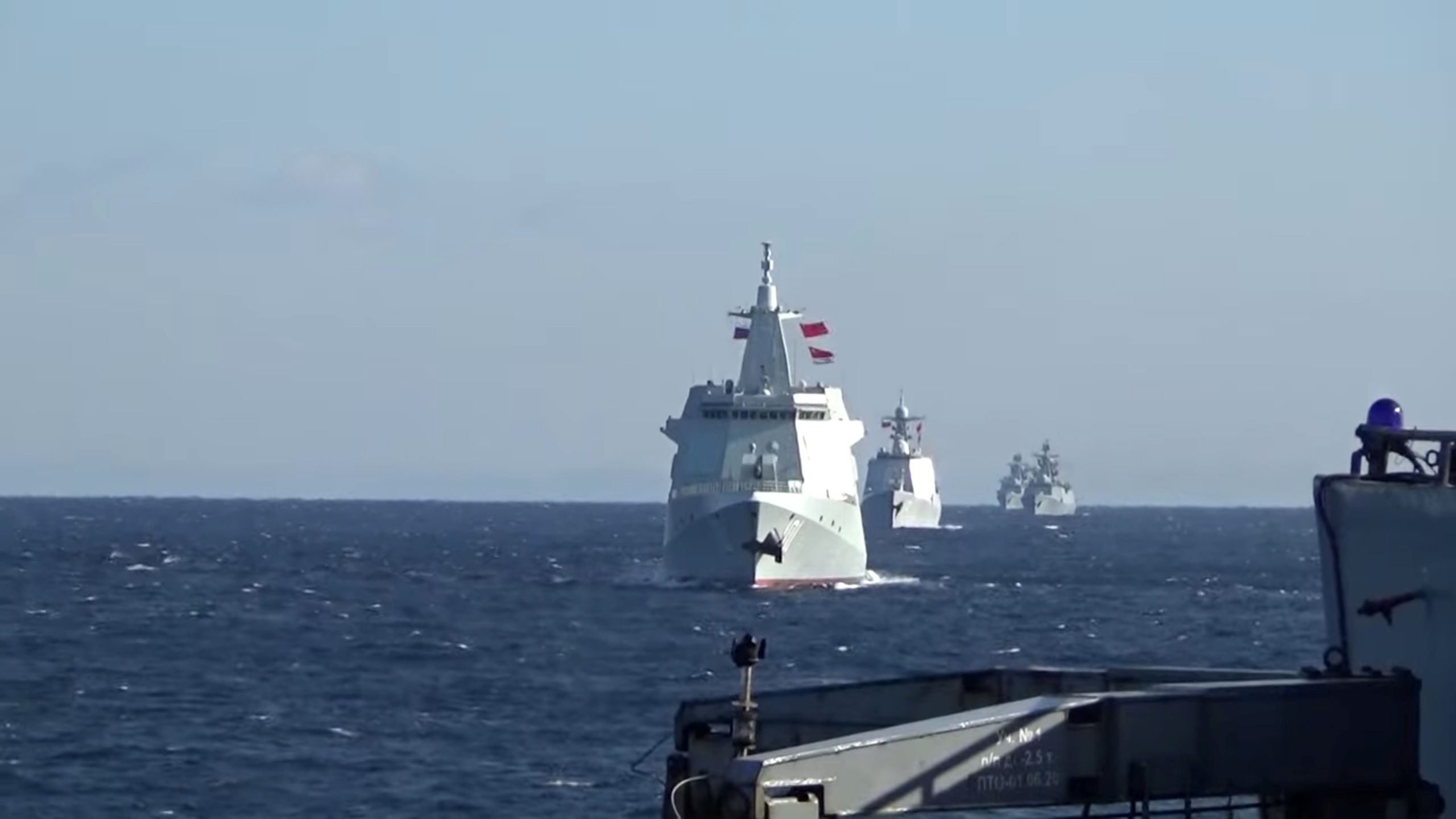 Russian and Chinese naval vessels conduct a maritime patrol in the Pacific Ocean