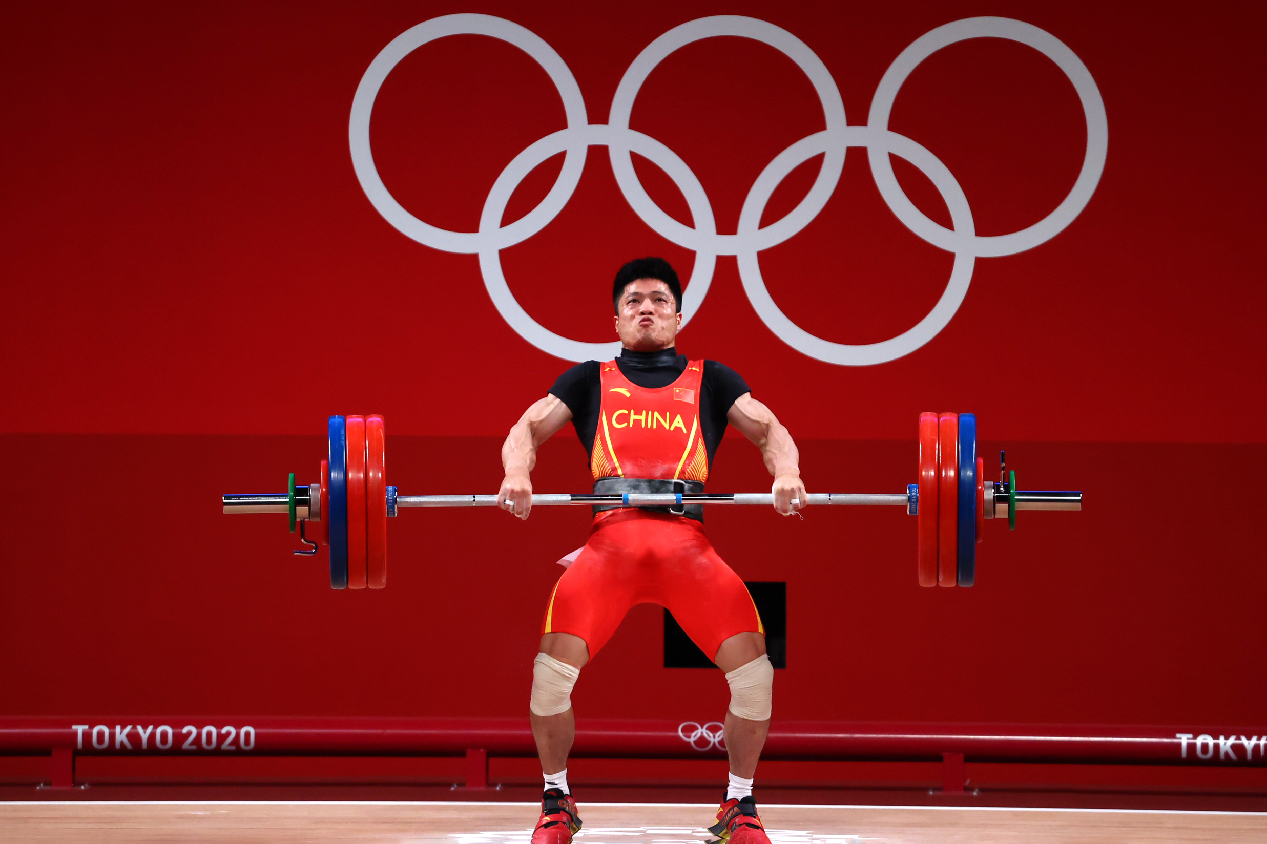 Weightlifting-China's Li Wins Gold In Men's 61kg | Reuters