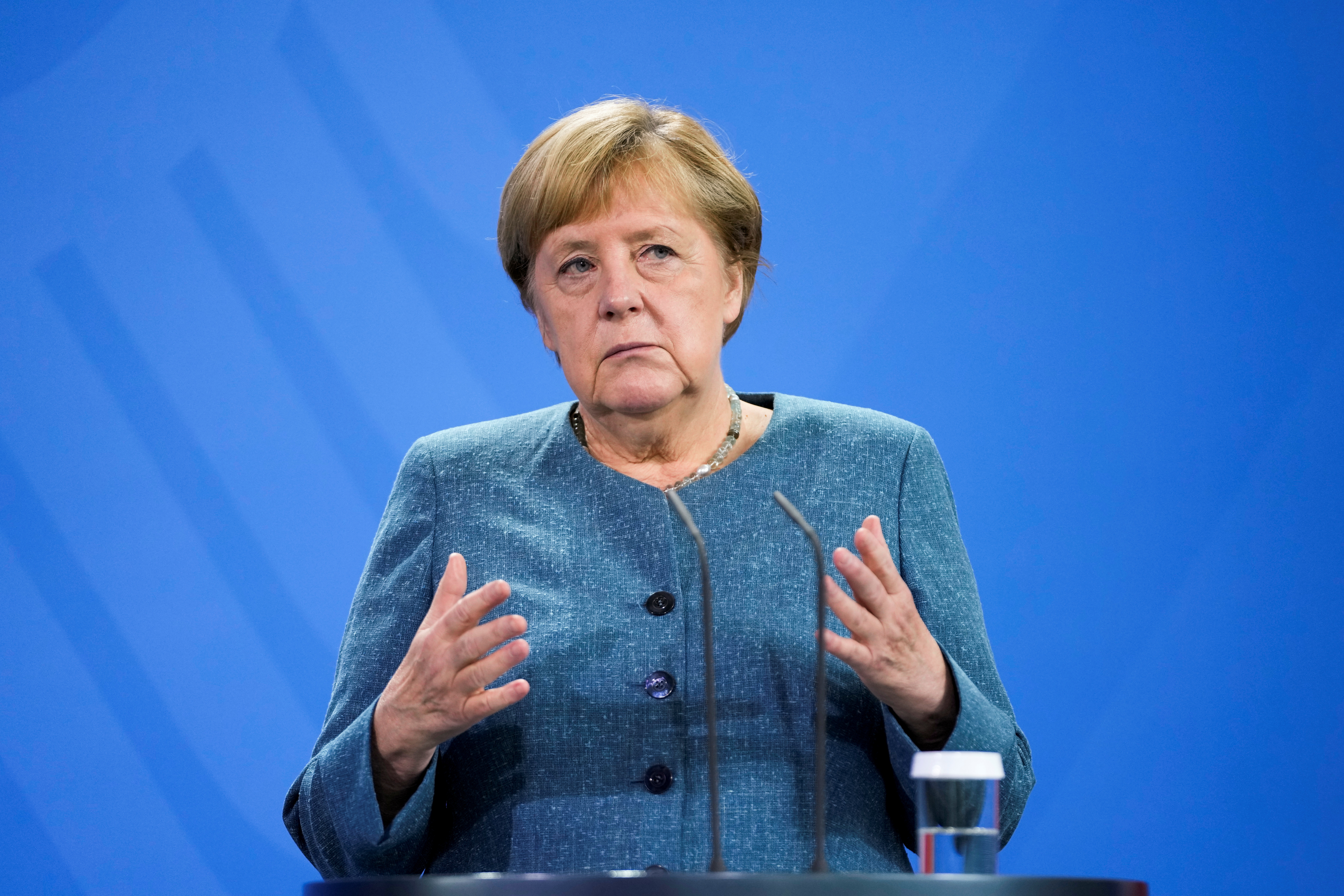 German Chancellor Angela Merkel and Austria's Chancellor Sebastian Kurz attend a news conference in Berlin
