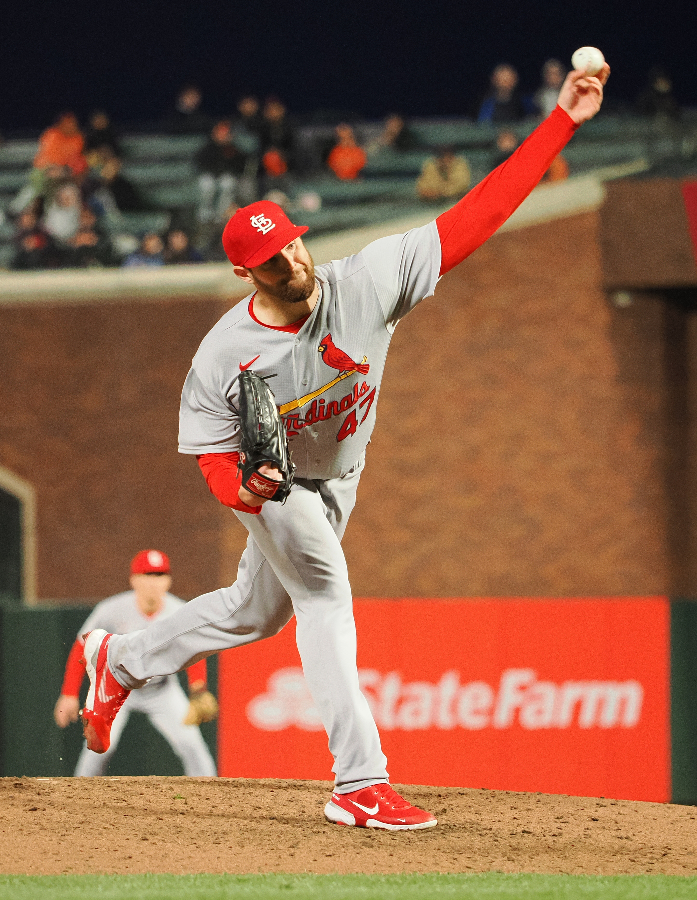 Flaherty pitches and hits Cardinals to 5-0 win