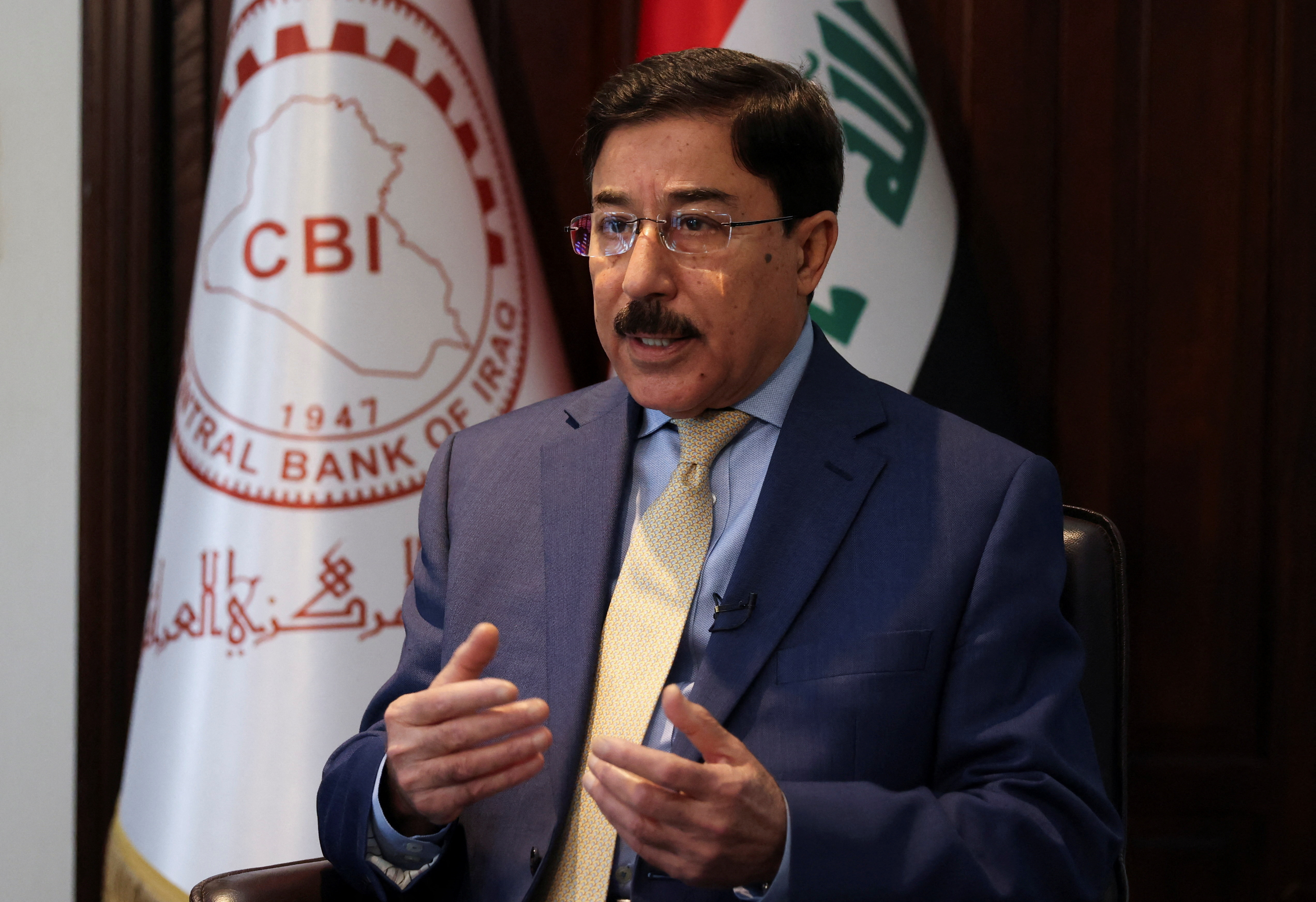 Iraqi central bank (CBI) Governor Ali Al-Allaq speaks during an interview with Reuters in Baghdad