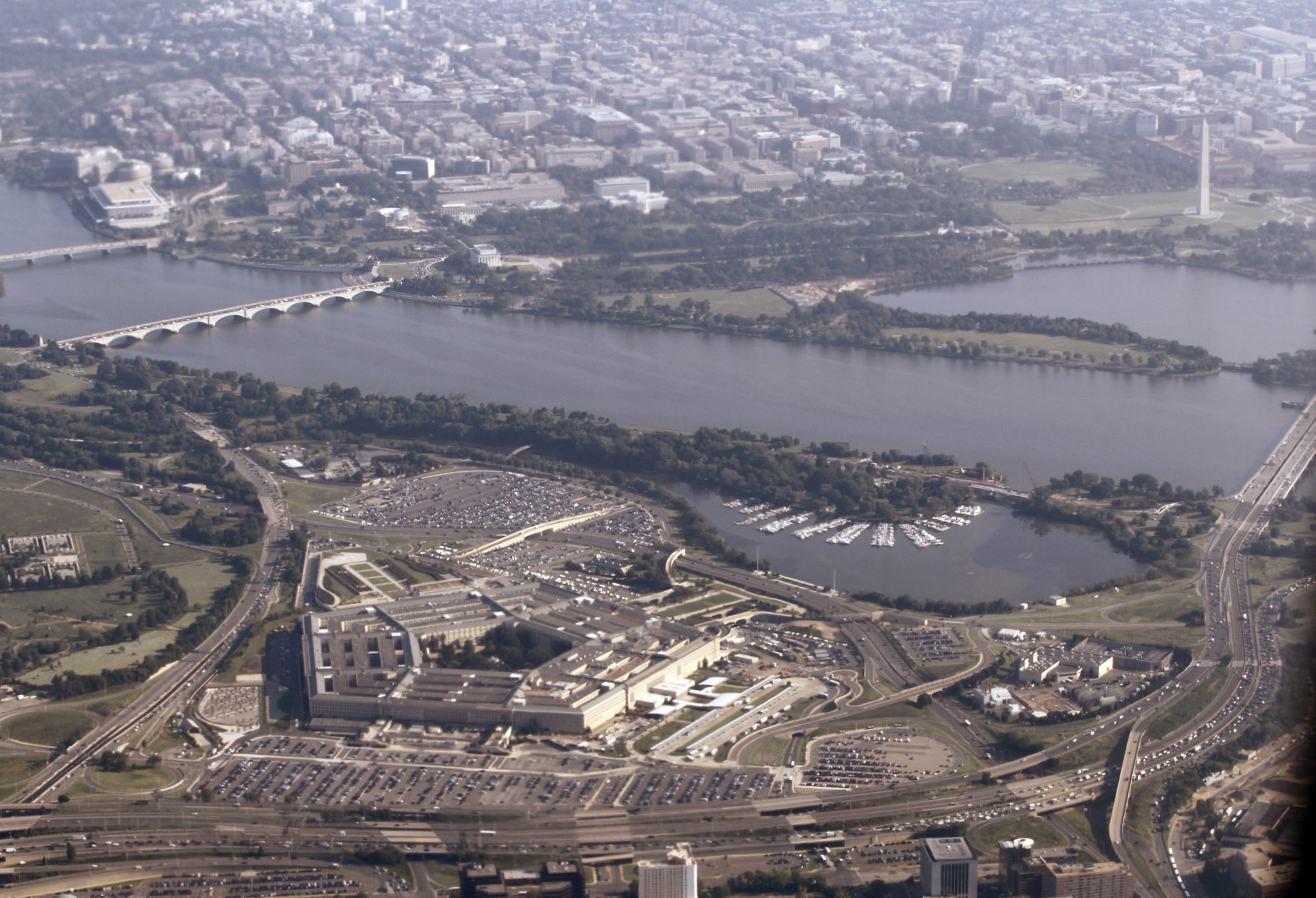 An aerial view of the Pentagon, Potomac River and Washington Monument