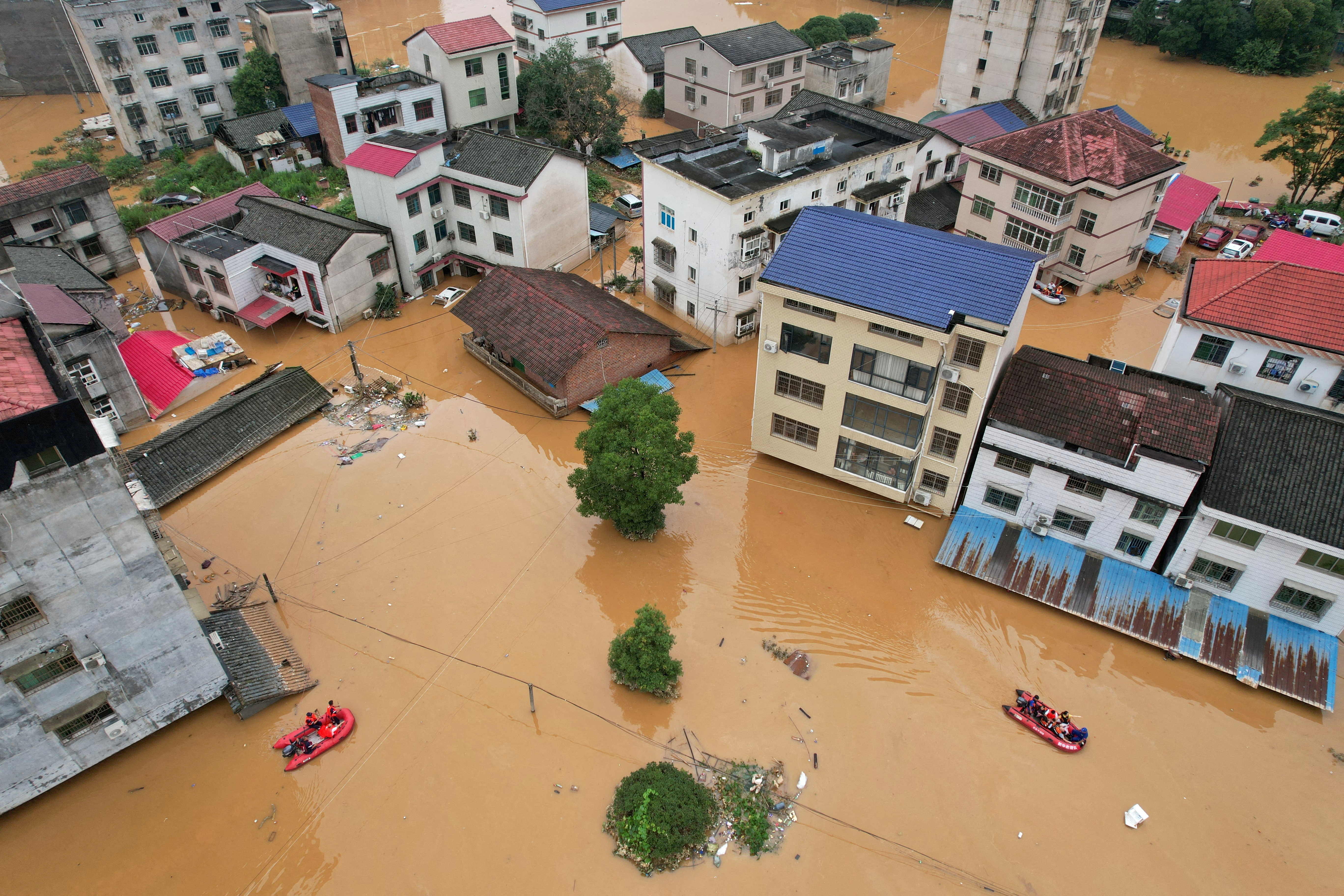 FILE PHOTO: Buildings submerged in floodwaters in Hunan province, China