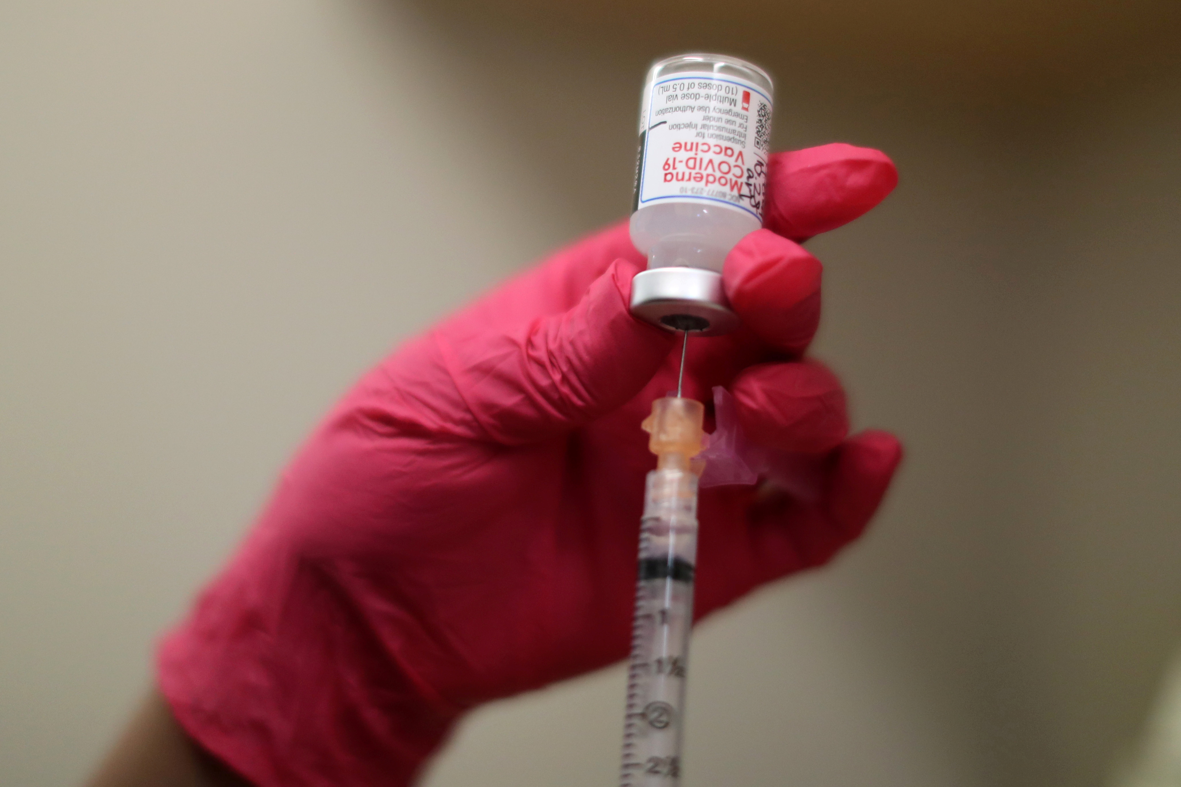 A nurse draws a Moderna coronavirus disease (COVID-19) vaccine, at East Valley Community Health Center in La Puente