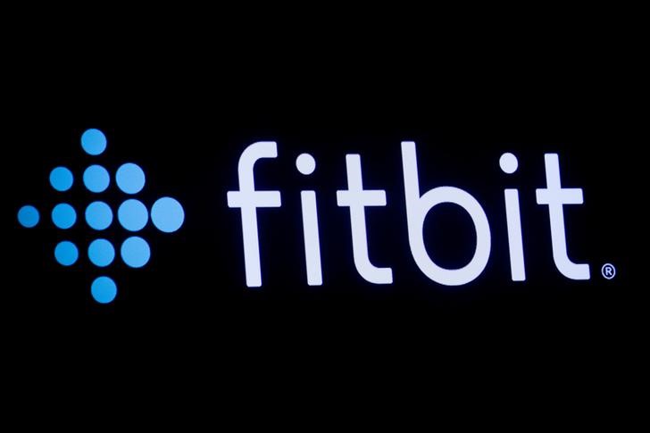 The logo for wearable device maker Fitbit Inc. is displayed on a screen at NYSE floor in New York