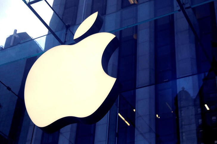 The Apple Inc. logo is seen hanging at the entrance to the Apple store on 5th Avenue in New York, U.S.