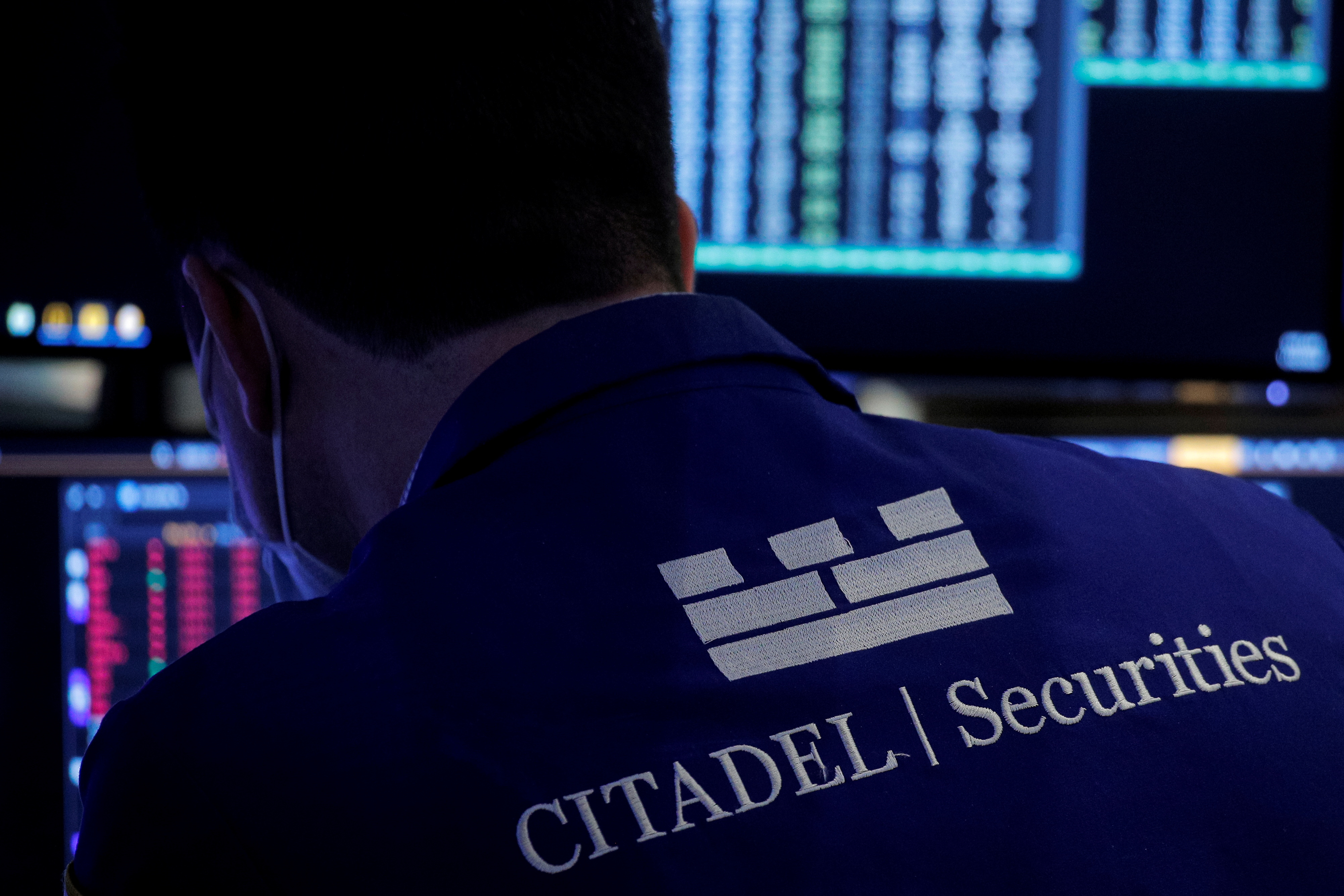 A trader works in the Citadel Securities booth on the floor of the NYSE in New York