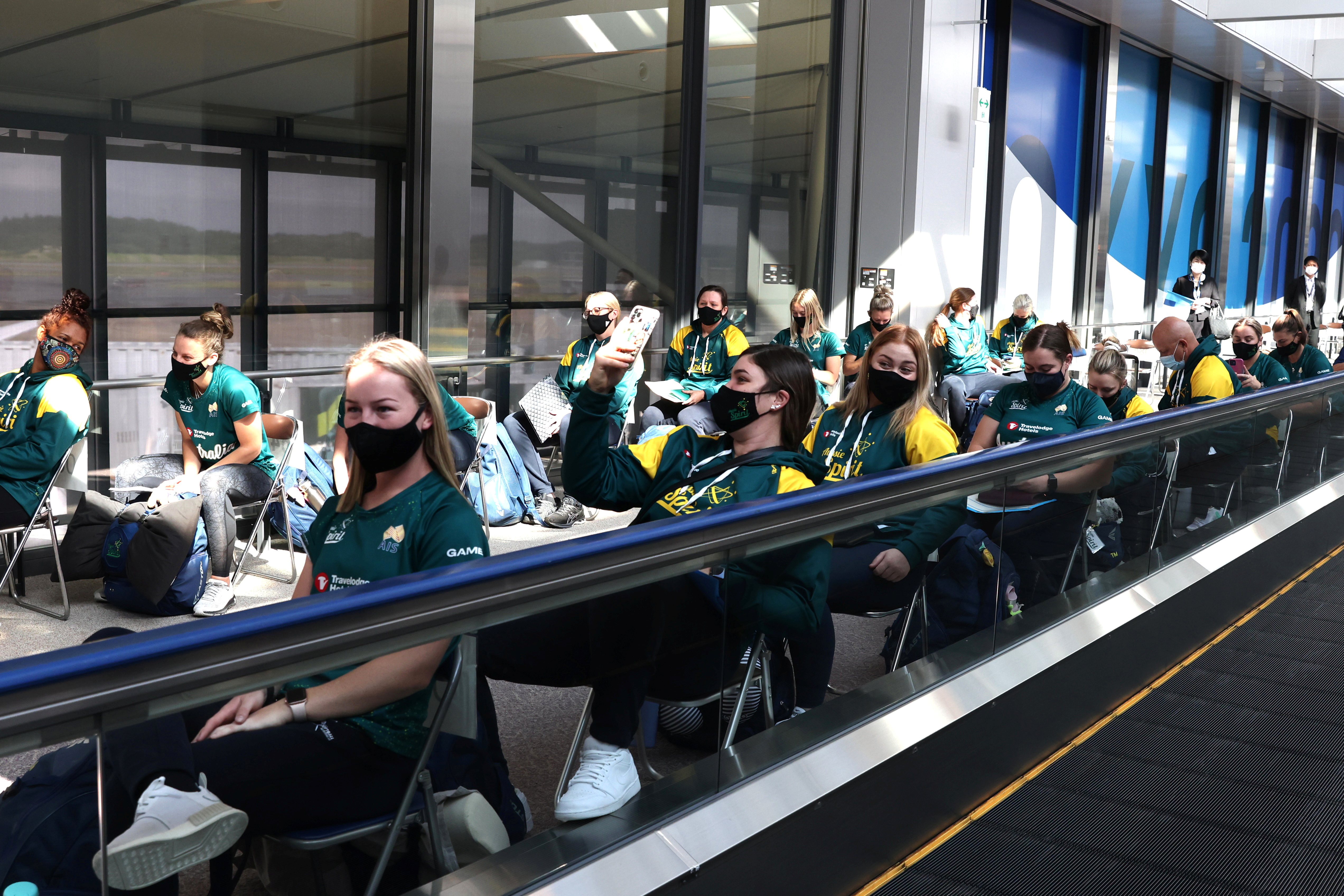 Australian softball national team players wait to take the quantitative antigen test after arriving at Narita Airport in Chiba prefecture, Japan, June 1, 2021, to take part in the upcoming Tokyo 2020 Olympic Games. Behrouz Mehri/Pool via REUTERS