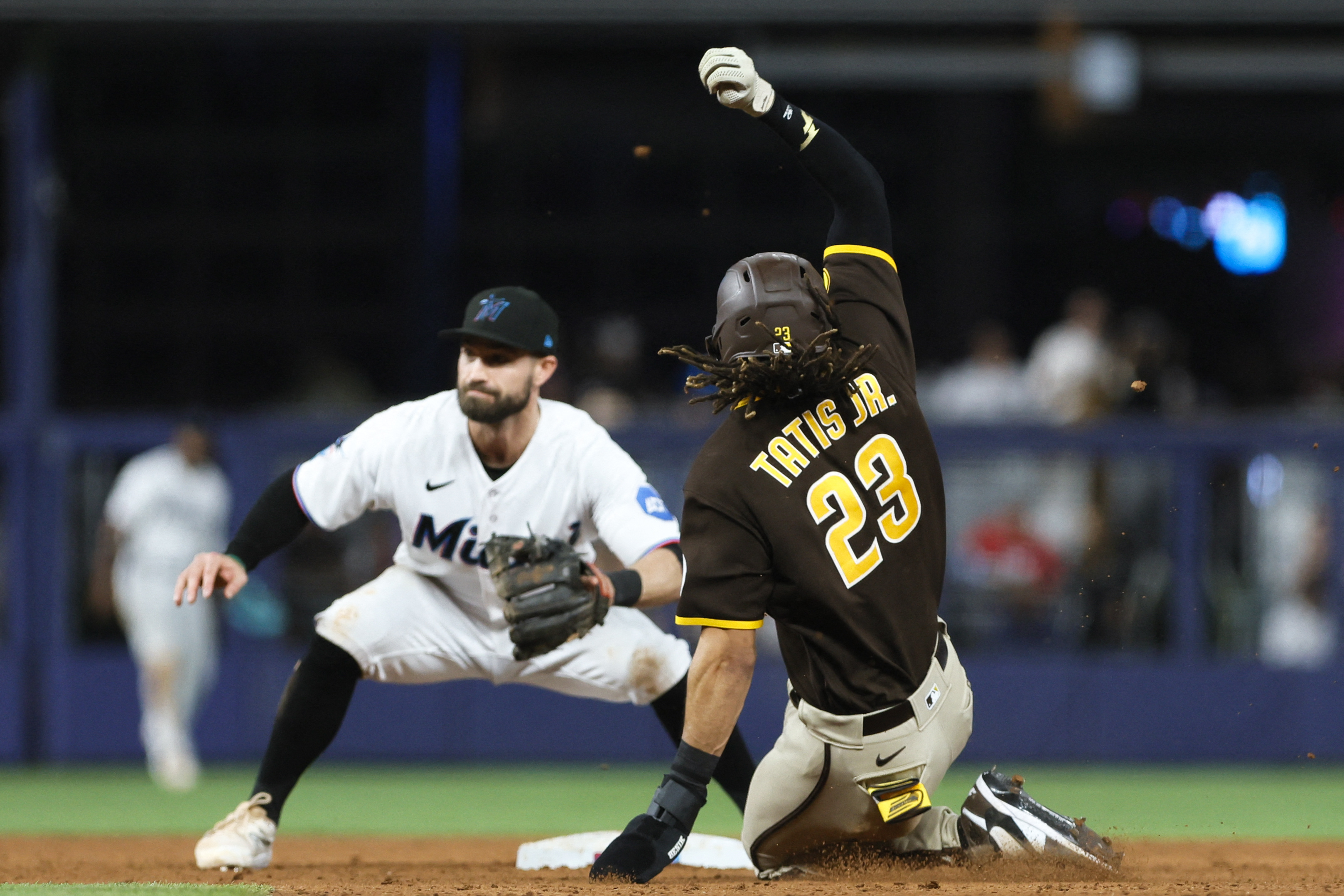 Padres rally past Marlins with five in ninth