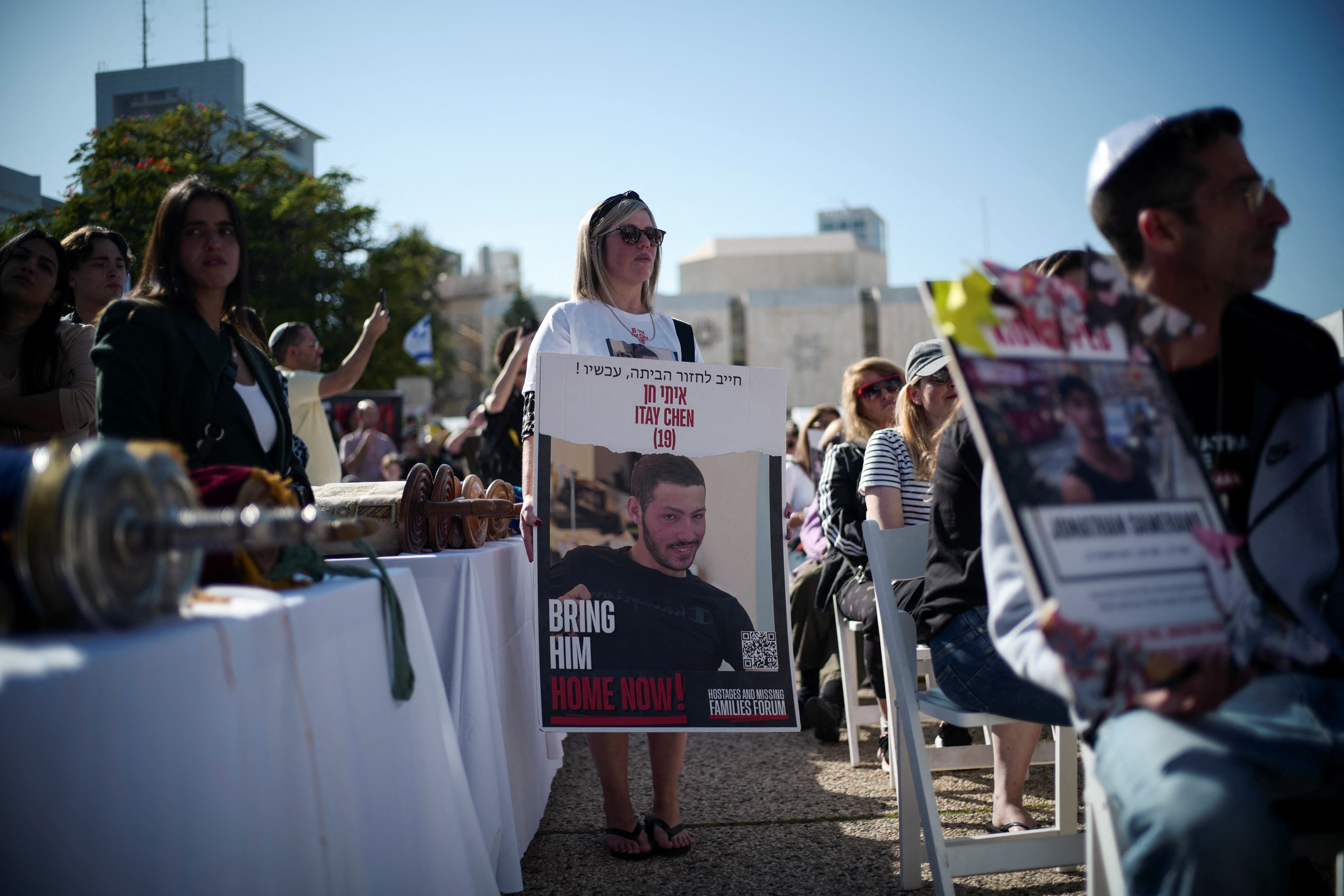 People attend a religious ceremony to pray for the hostages and call for their immediate release, in Tel Aviv
