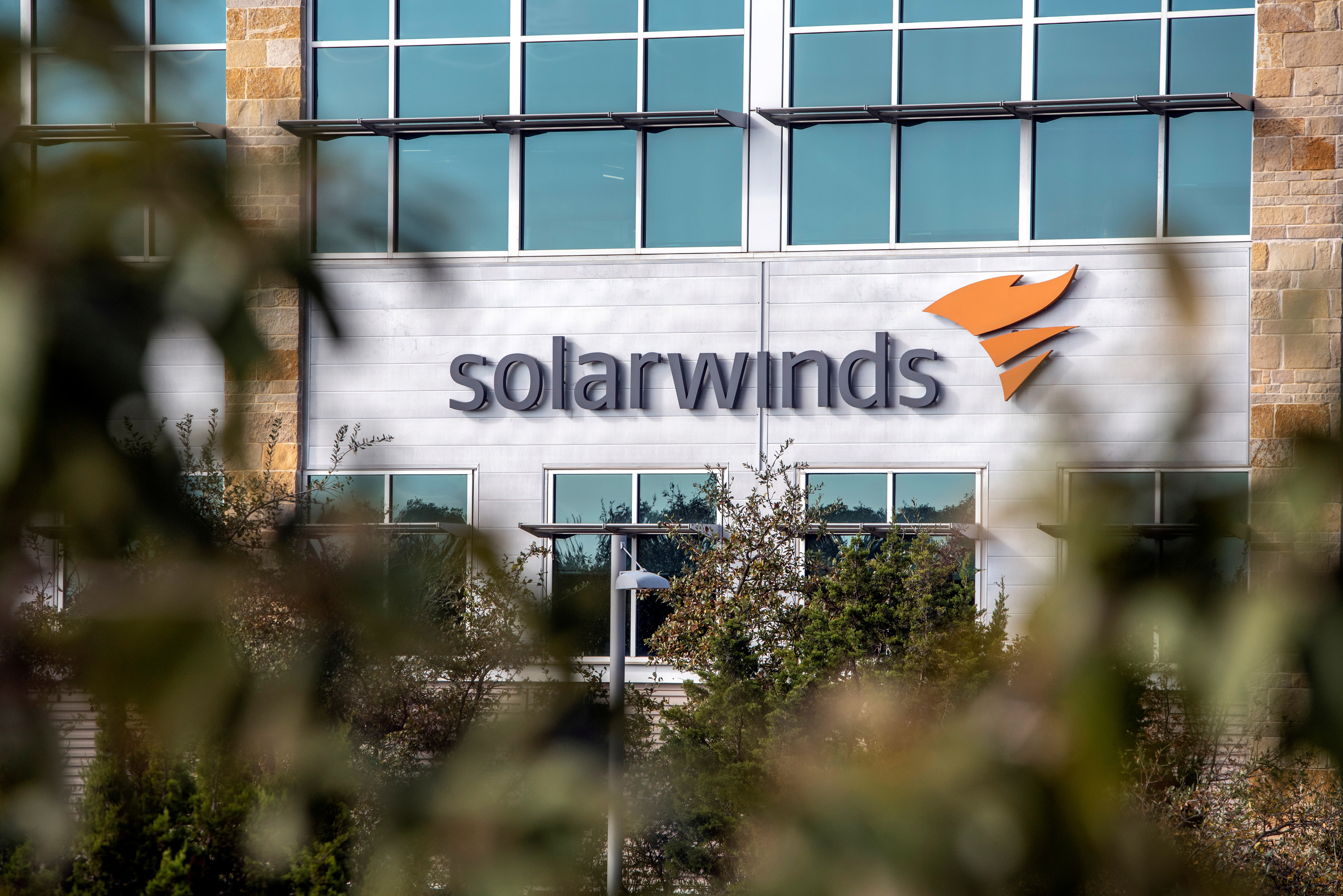 The SolarWinds logo is seen outside its headquarters in Austin, Texas, U.S., December 18, 2020. REUTERS/Sergio Flores