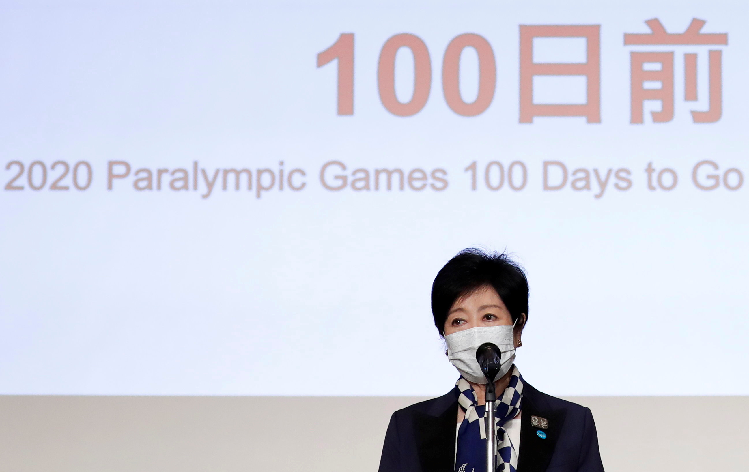 Tokyo Governor Yuriko Koike delivers a speech during  a ceremony to mark 100 days until the opening of the Tokyo 2020 Paralympic Games that have been postponed to 2021 due to the coronavirus disease (COVID-19) outbreak, at Tokyo Metropolitan Government building in Tokyo, Japan May 16, 2021. REUTERS/Issei Kato/Pool