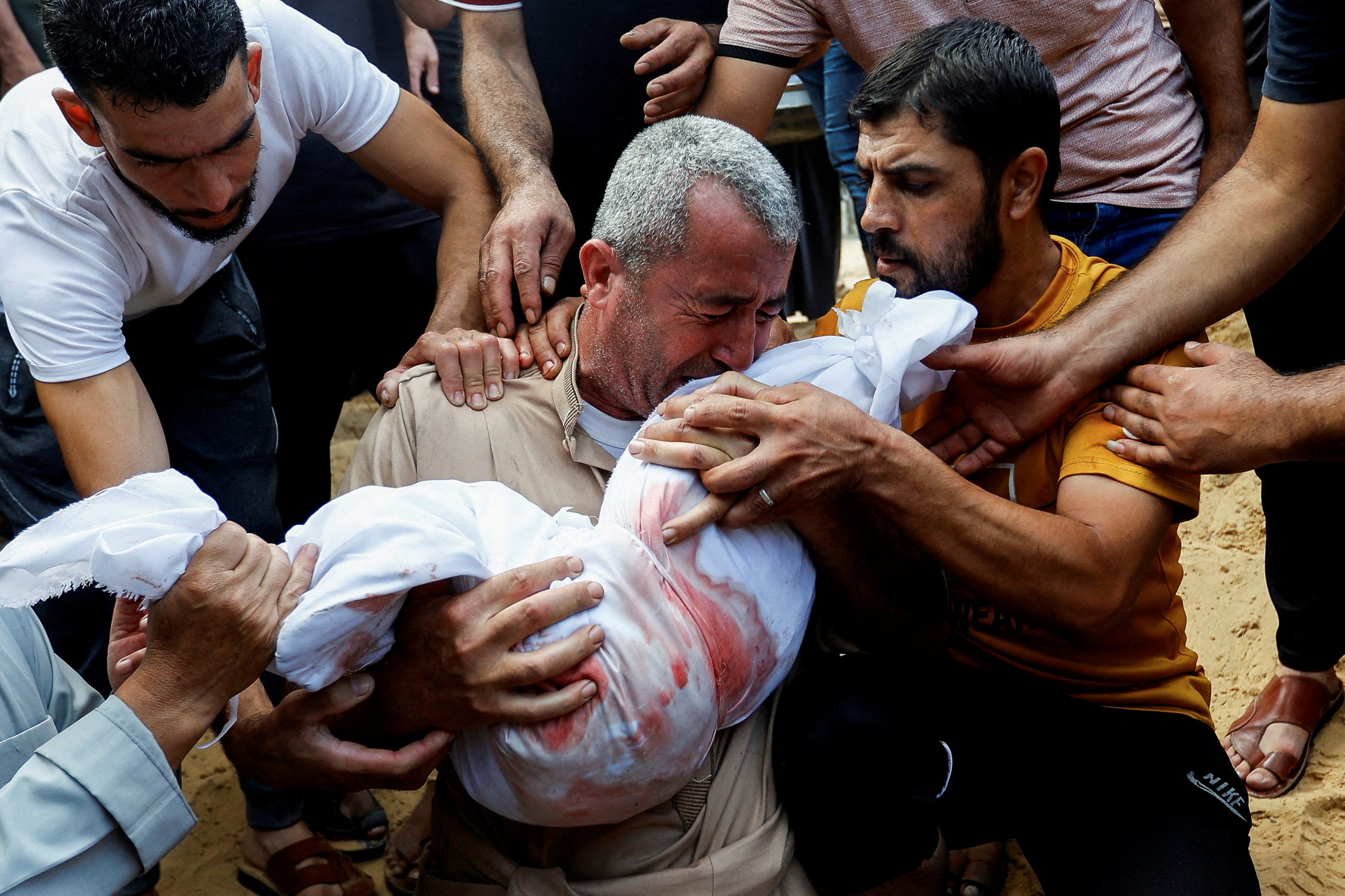 Funerals in Israel and Gaza as deaths climb on both sides - October 12,  2023 | Reuters