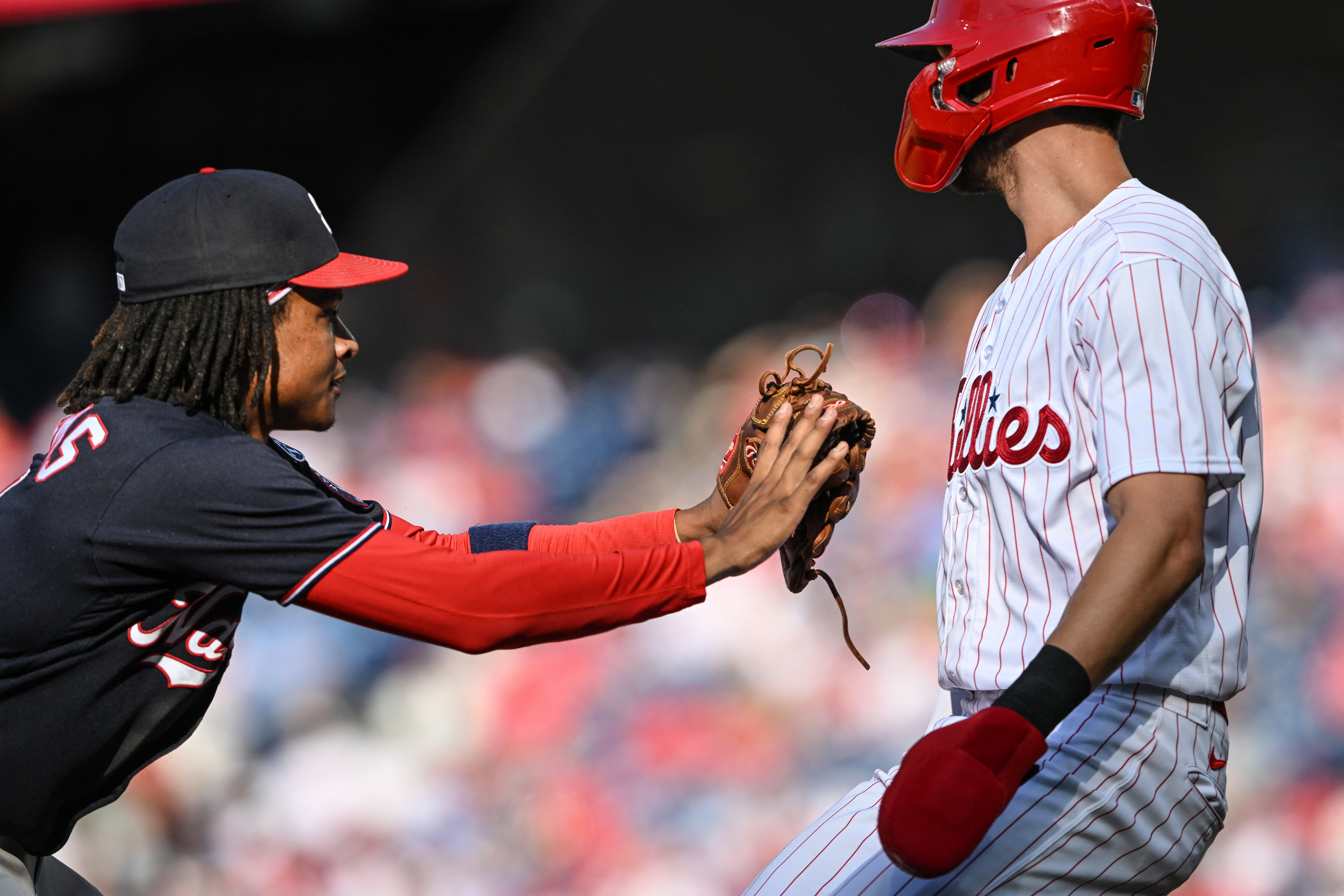 Joey Meneses homers twice as Nats split with Phillies