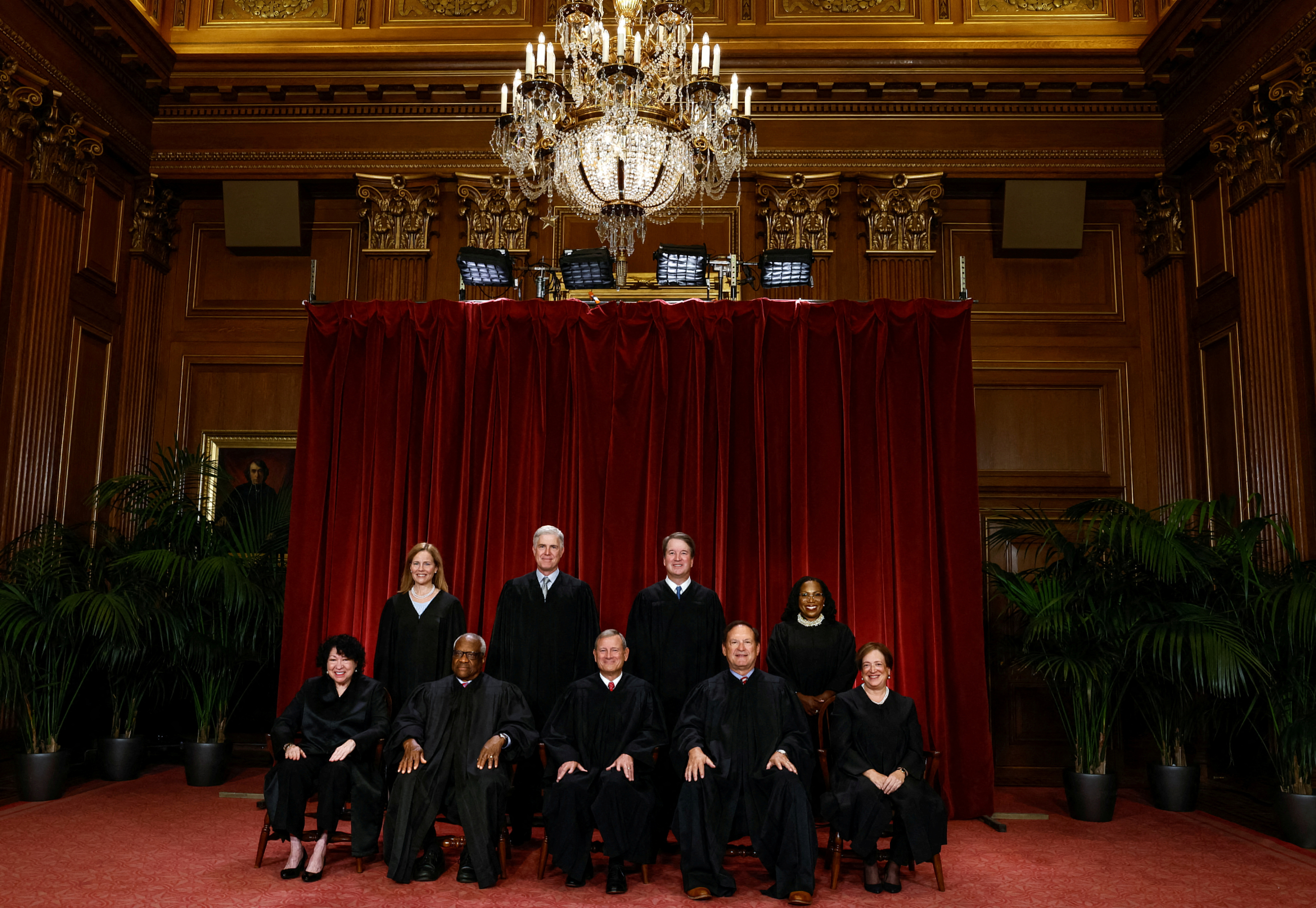 U.S. Supreme Court justices pose for their group portrait at the Supreme Court in Washington