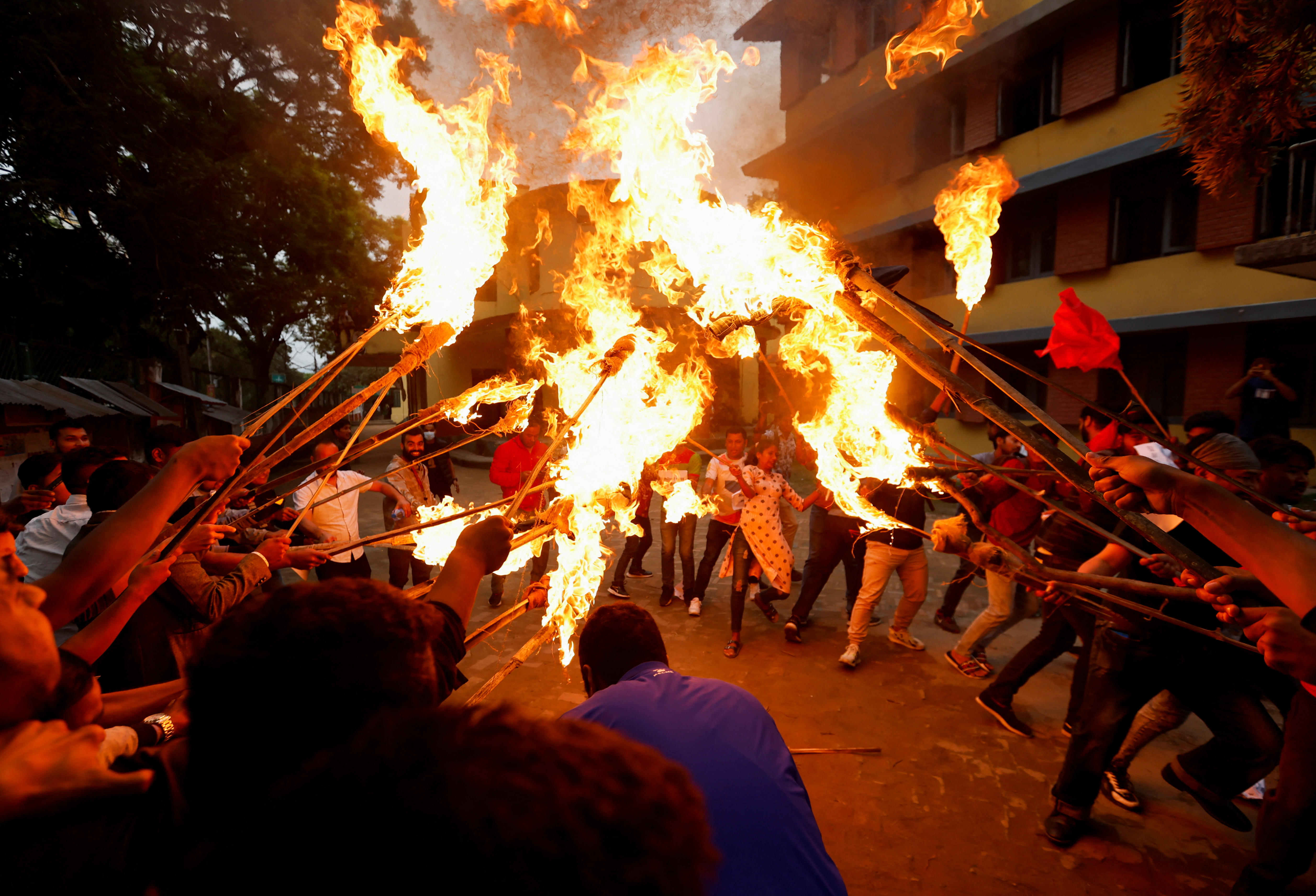 Students affiliated with the main opposition party take part in a protest against the rise in fuel prices in Kathmandu